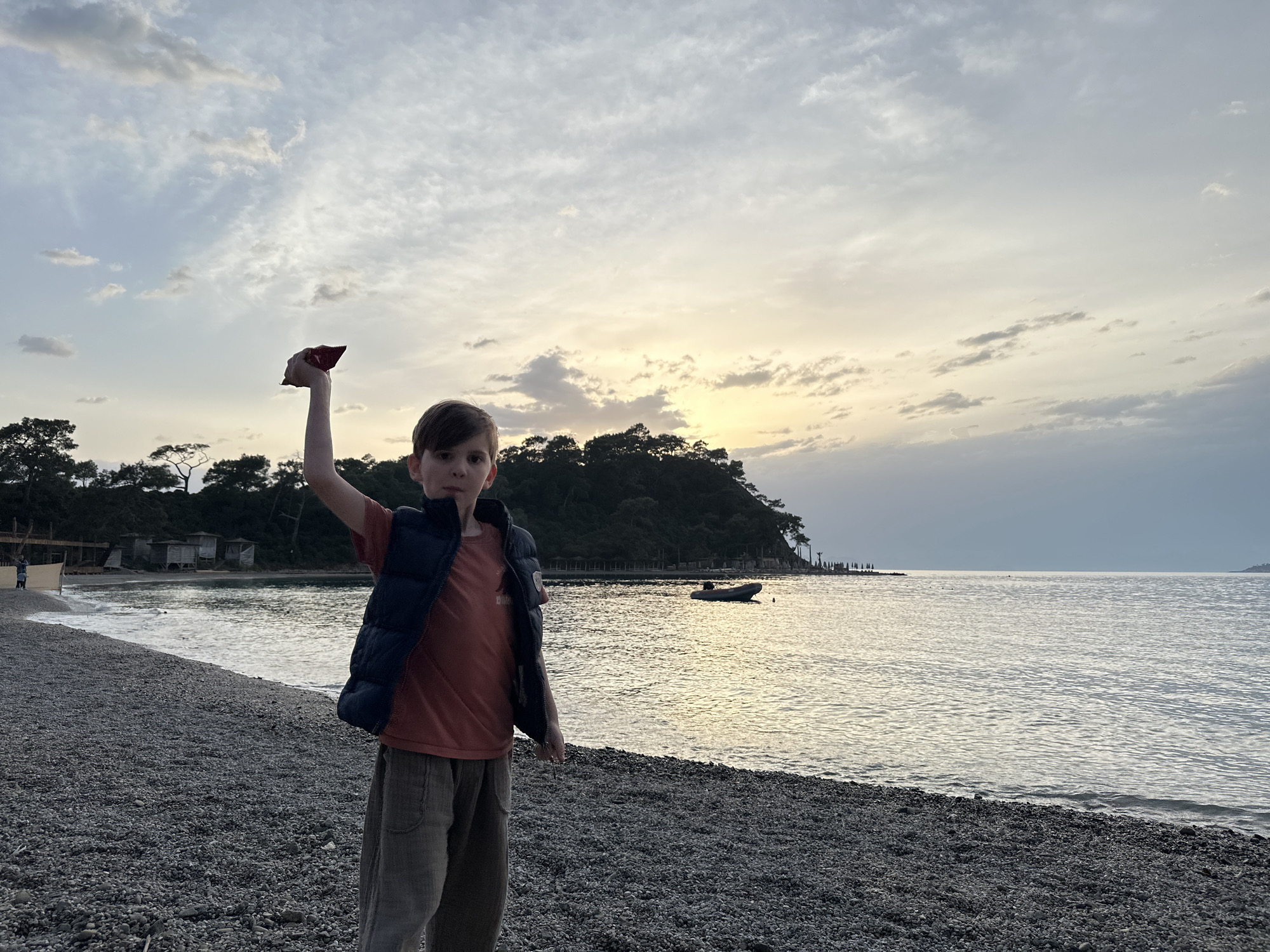 Family enjoys afternoon beach time at Fethiye coastline