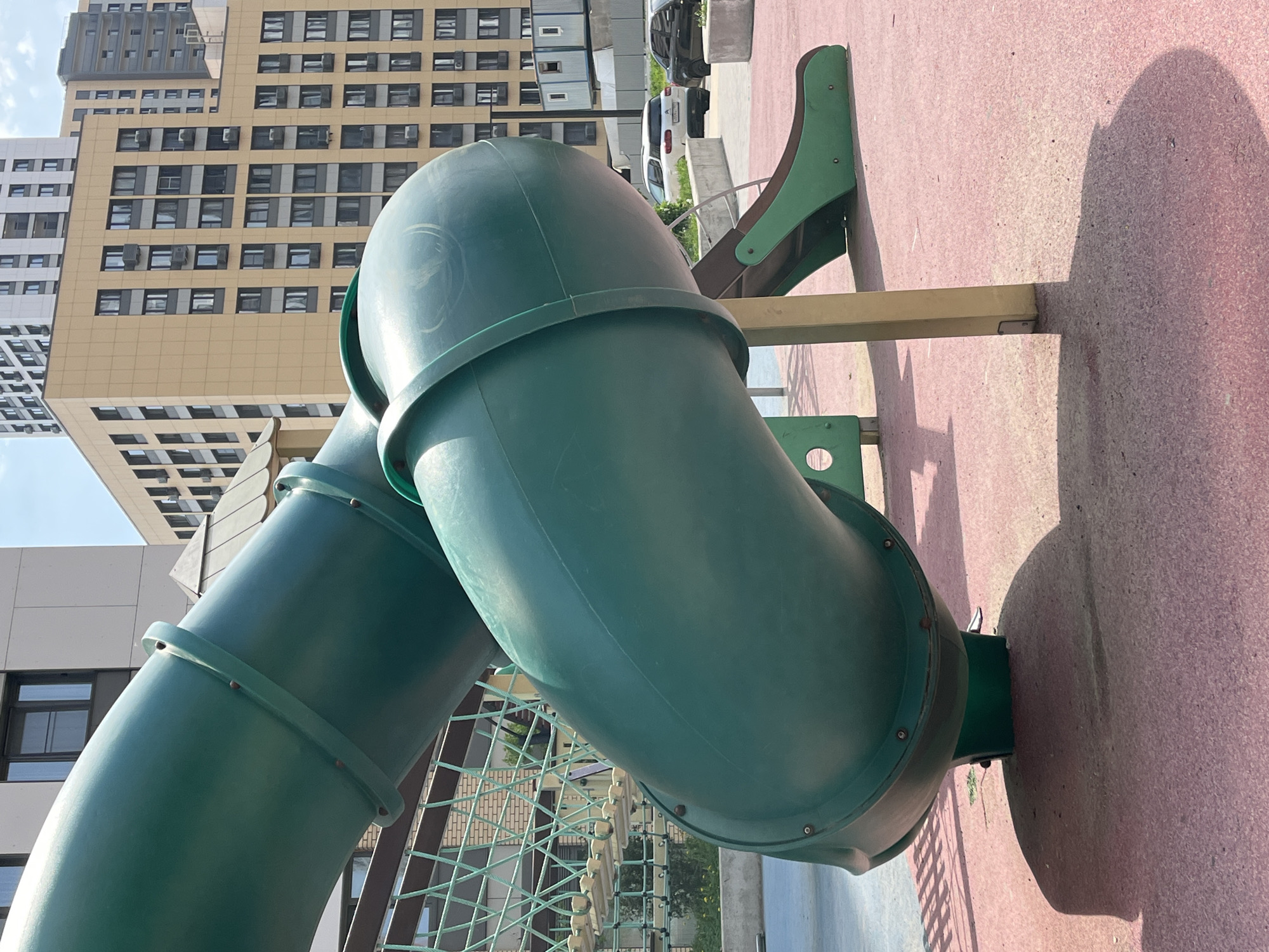 Moscow playground scene captured with slide, swing, toy car