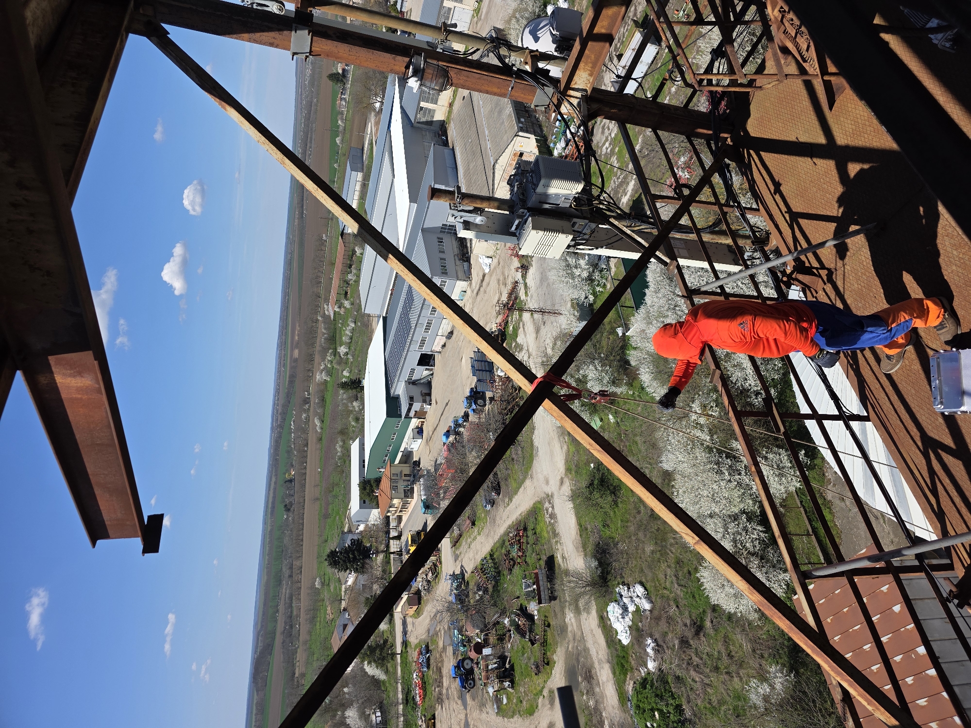 Worker maintains telecommunications tower in Krushari, Bulgaria
