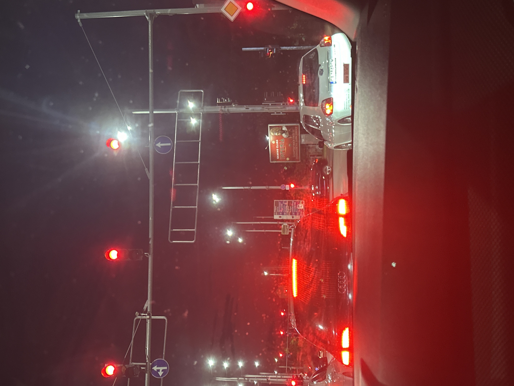 Late-night drive through Plovdiv intersections, fog and red lights