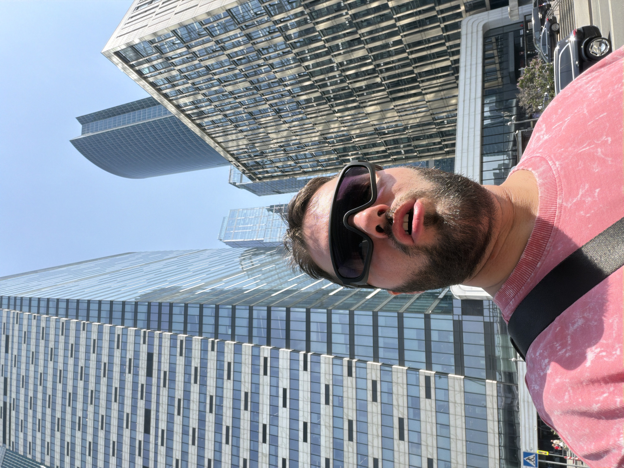 Man takes selfie amid modern buildings in Khimki