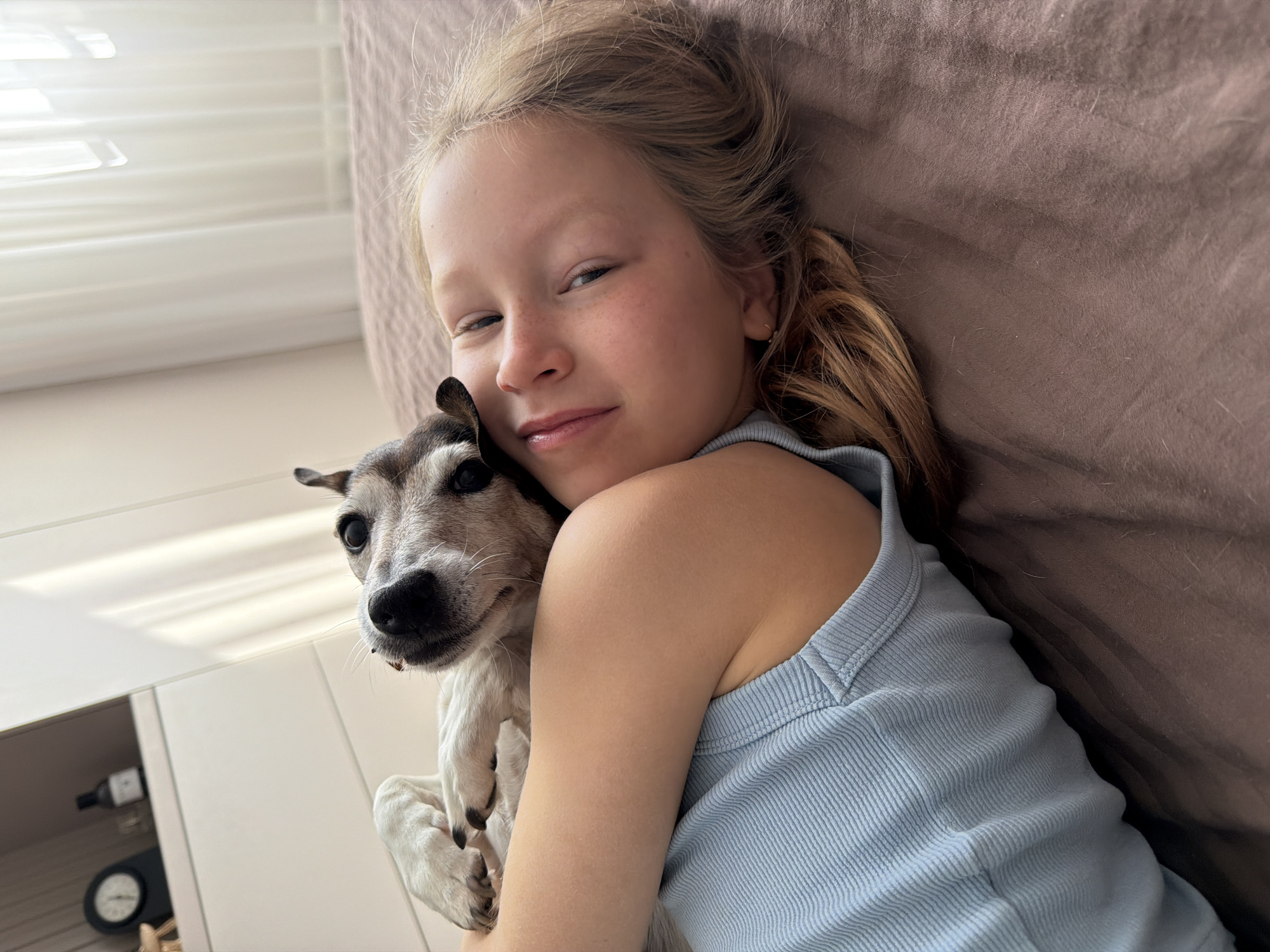Girl and small dog observed in quiet Russian villages