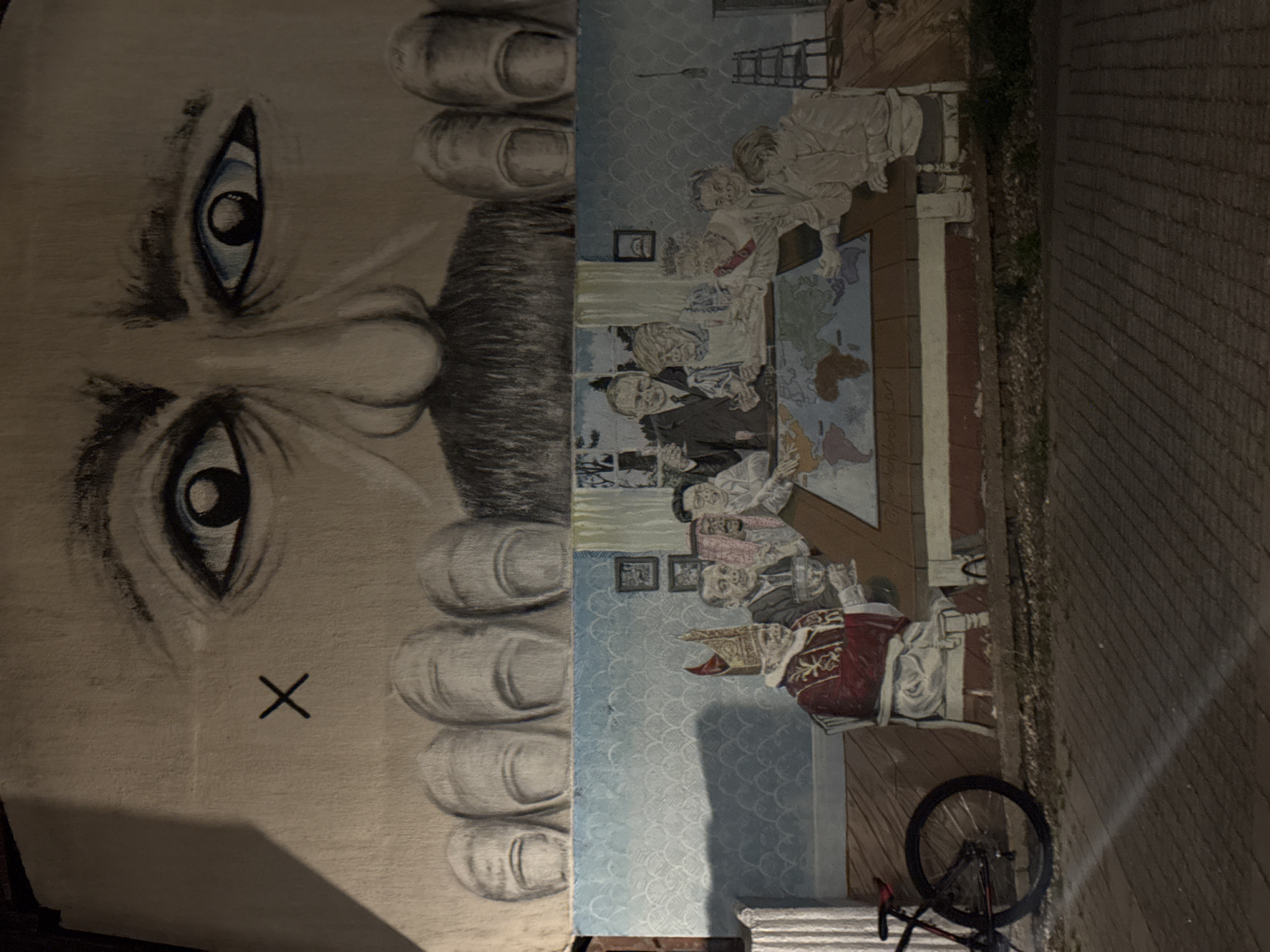 Night mural in Zvezdara: big face, mustache, hands