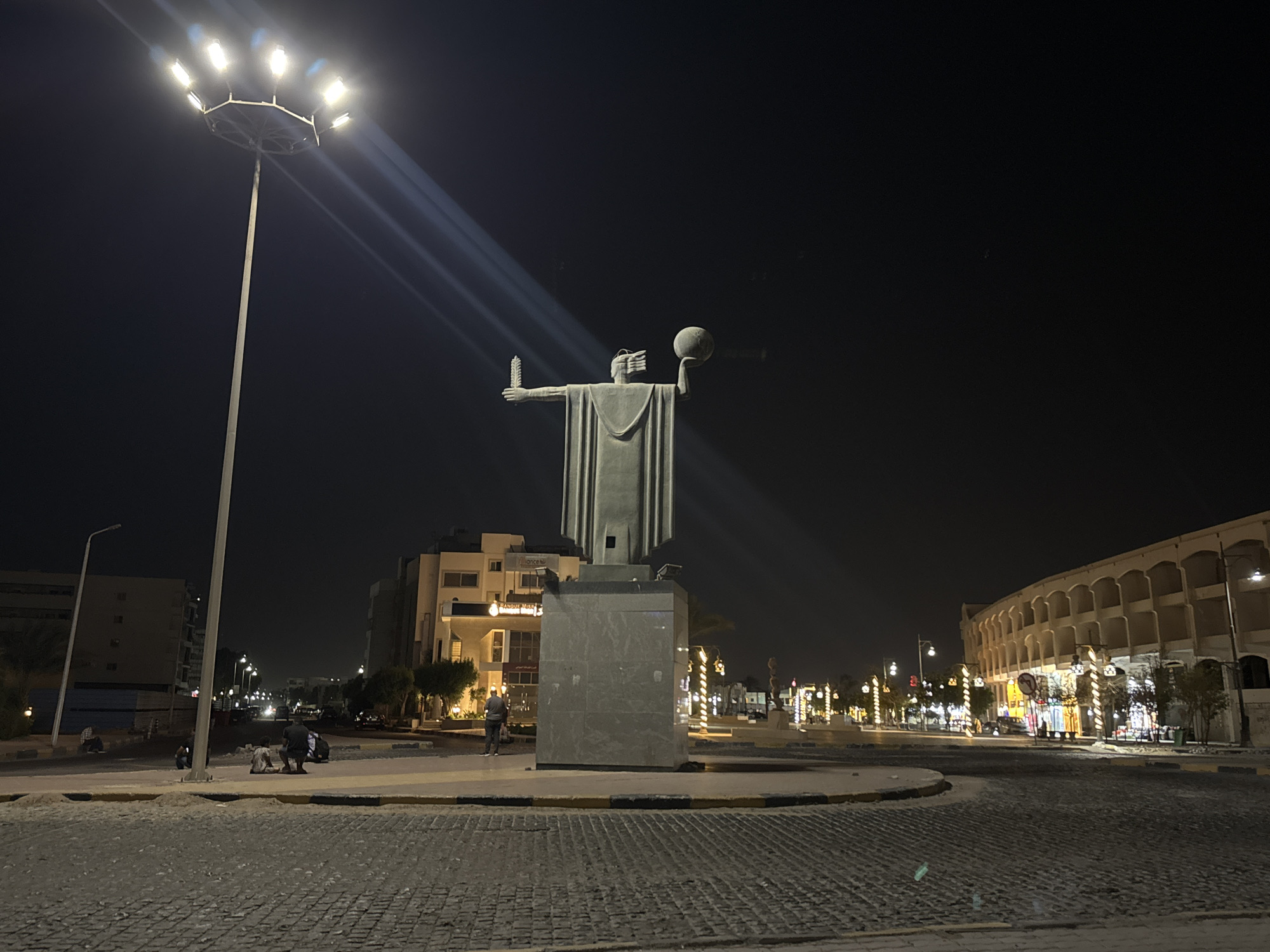 Evening urban scenes captured across illuminated city spaces