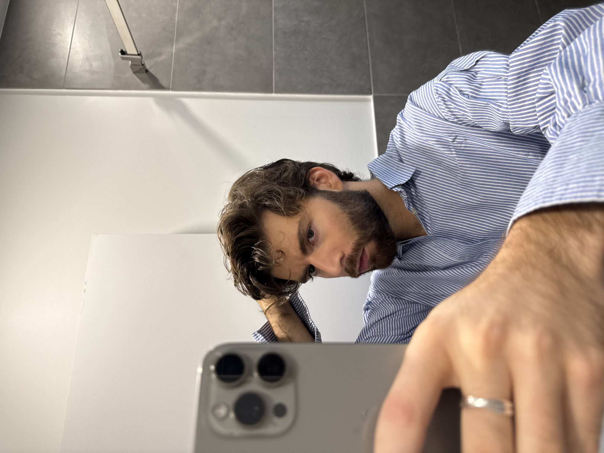 Man documents evening with selfies and wine in Montreal apartment