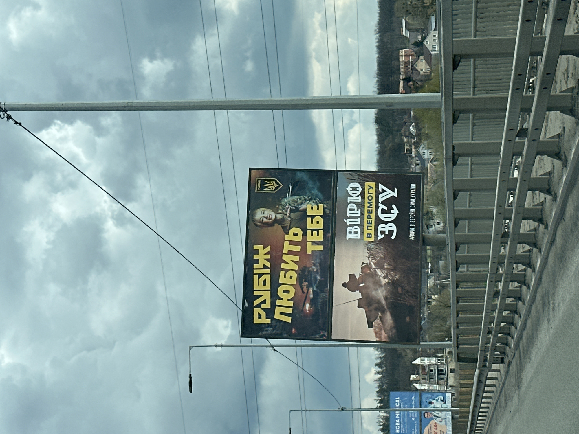 Everyday scenes captured in Hostomel, Ukraine including billboards and gas station