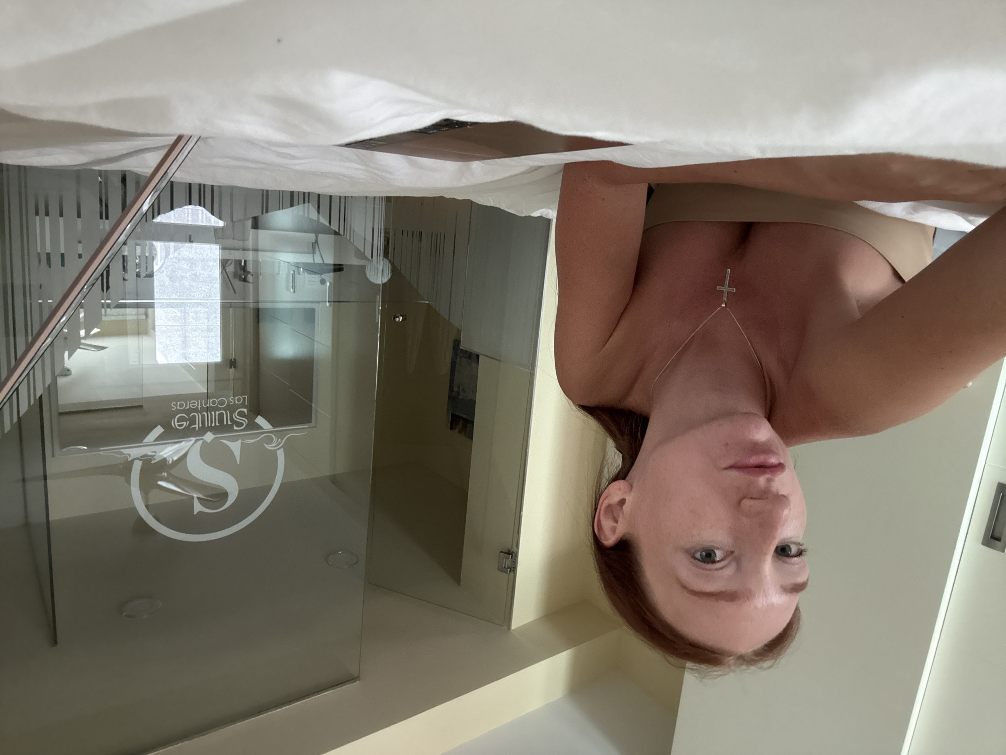 Woman takes indoor selfie in Las Palmas, Spain