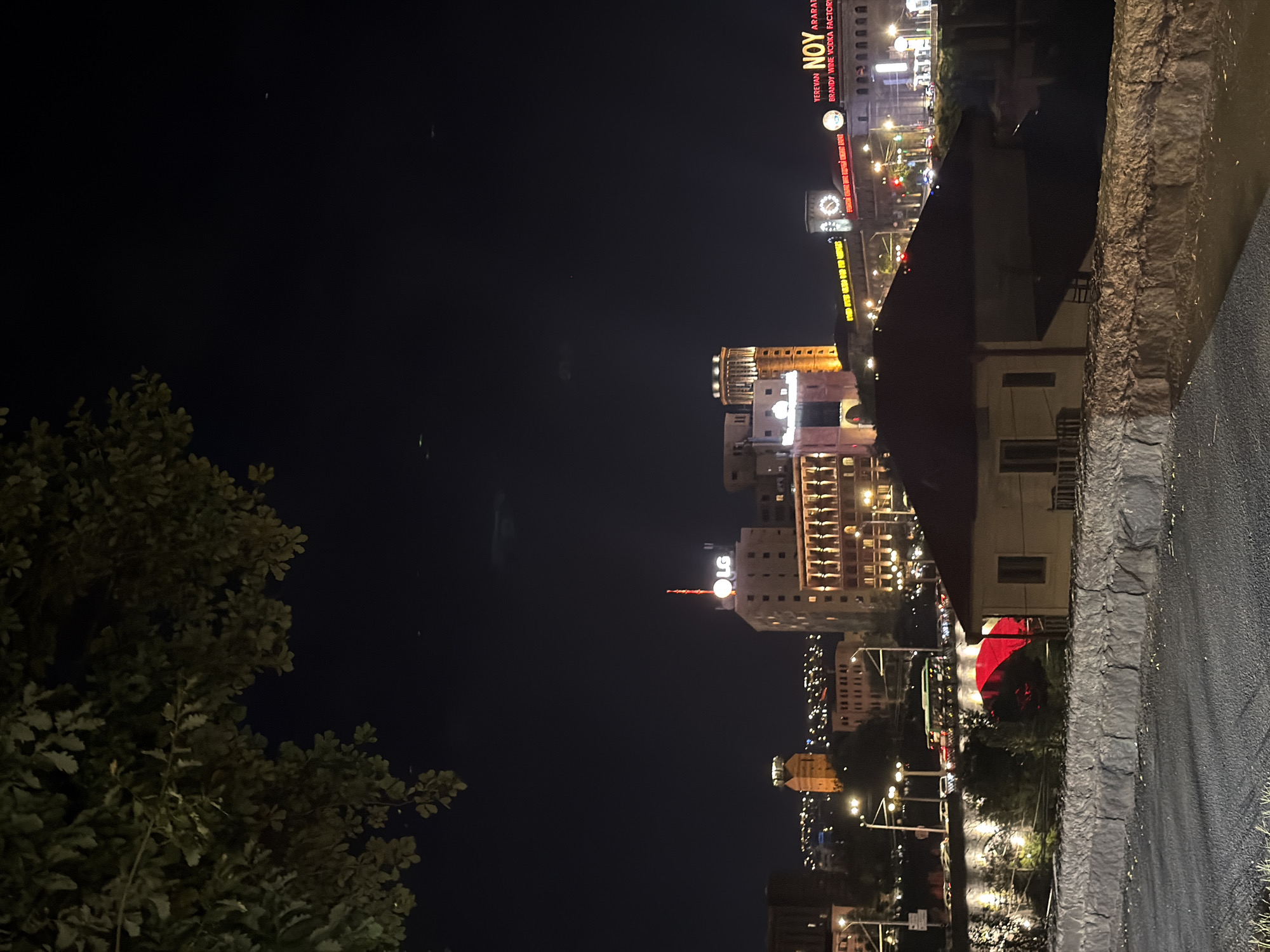 Evening drive through Yerevan past Republic Square and Ararat signs