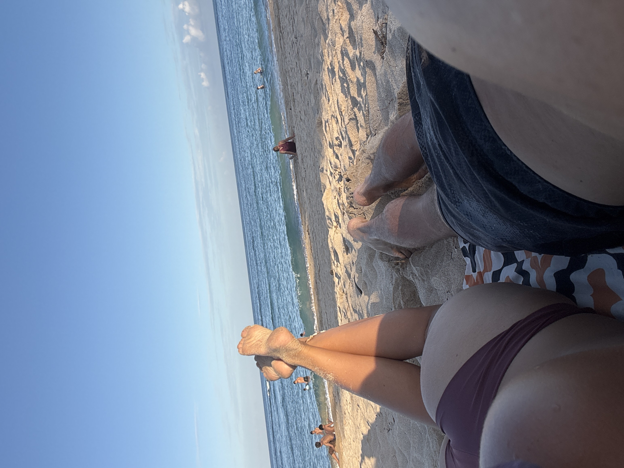 Morning beach activities unfold at Kuta Selatan, Indonesia