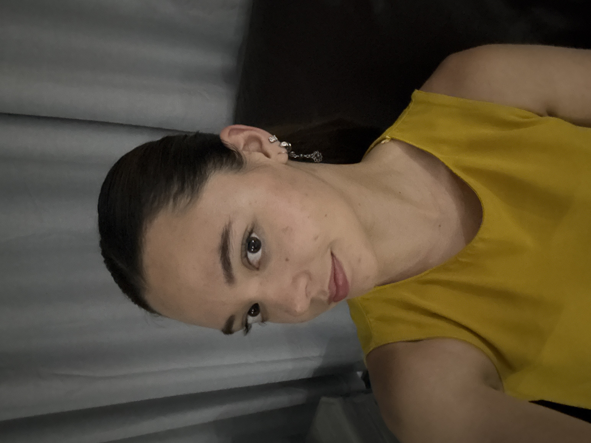 Woman takes selfie indoors in Santa Clara Ocoyucan, Mexico