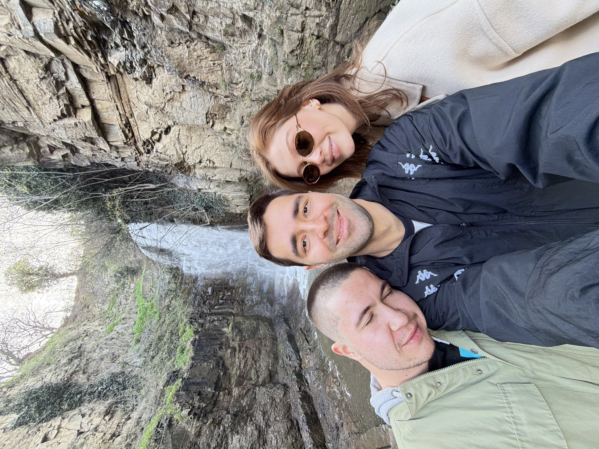 Tourists photograph themselves at Tbilisi waterfall viewing platform