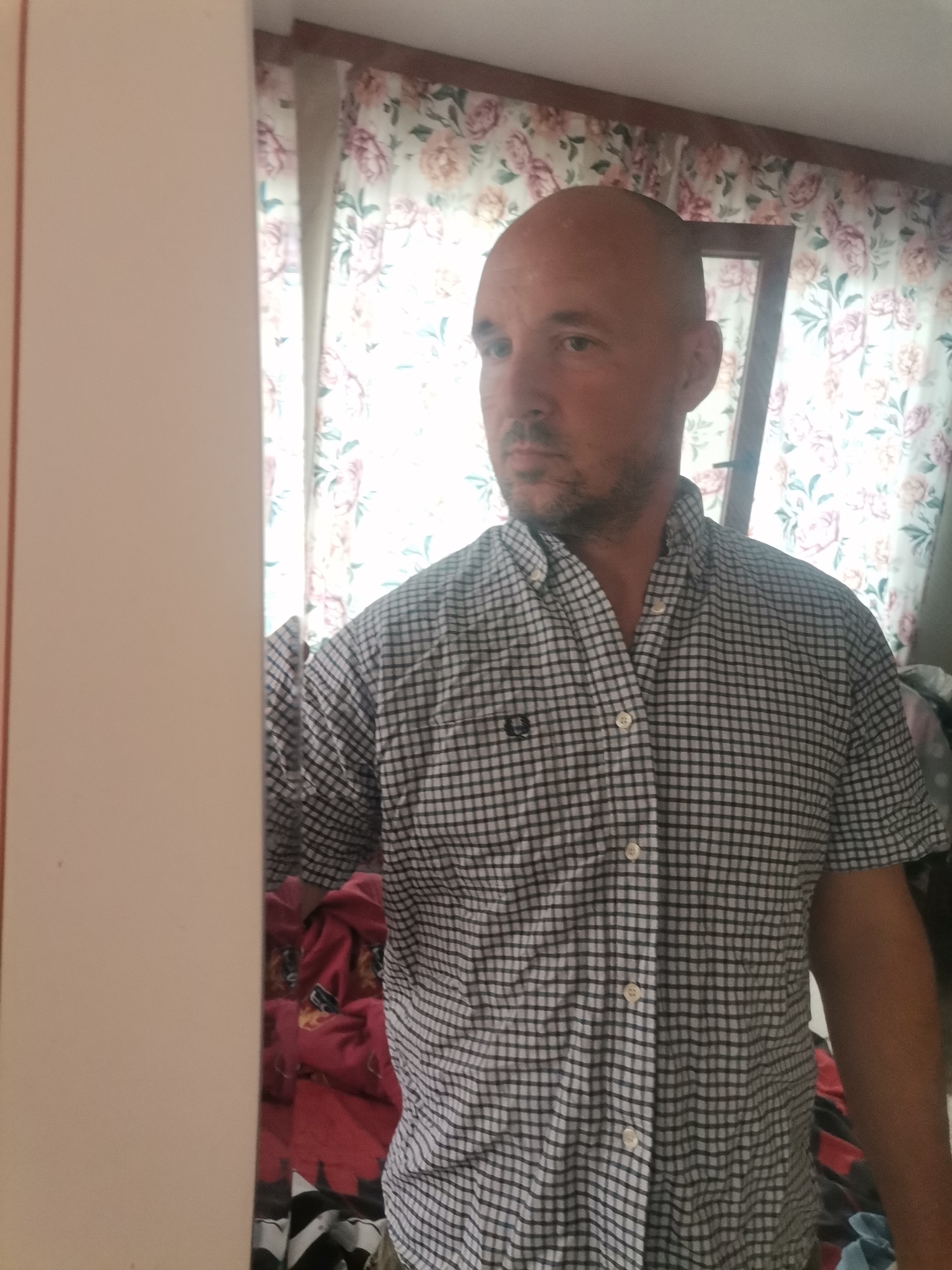 Man Takes Morning Mirror Selfies in Bedroom