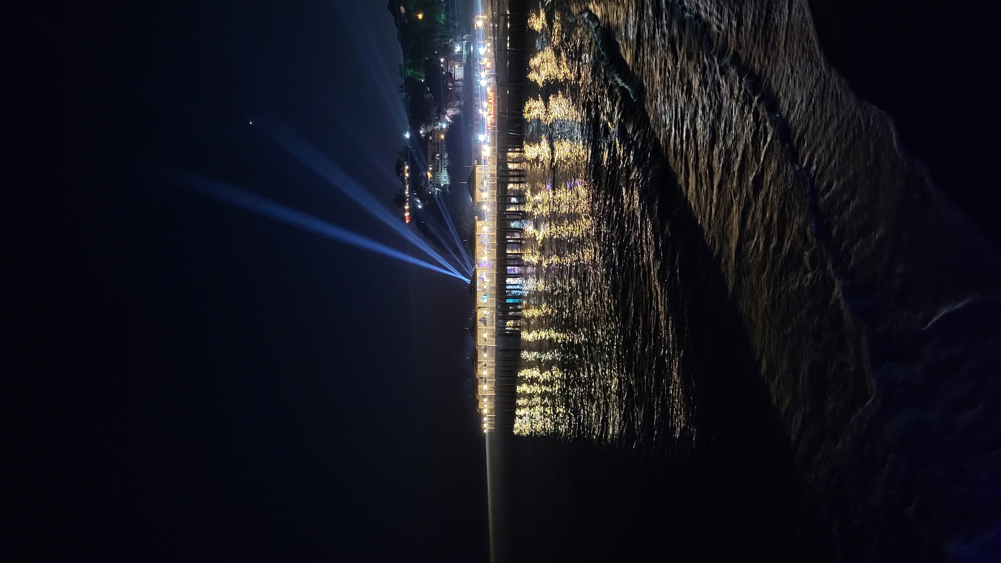 Full moon night along Alanya's lit waterfront pier