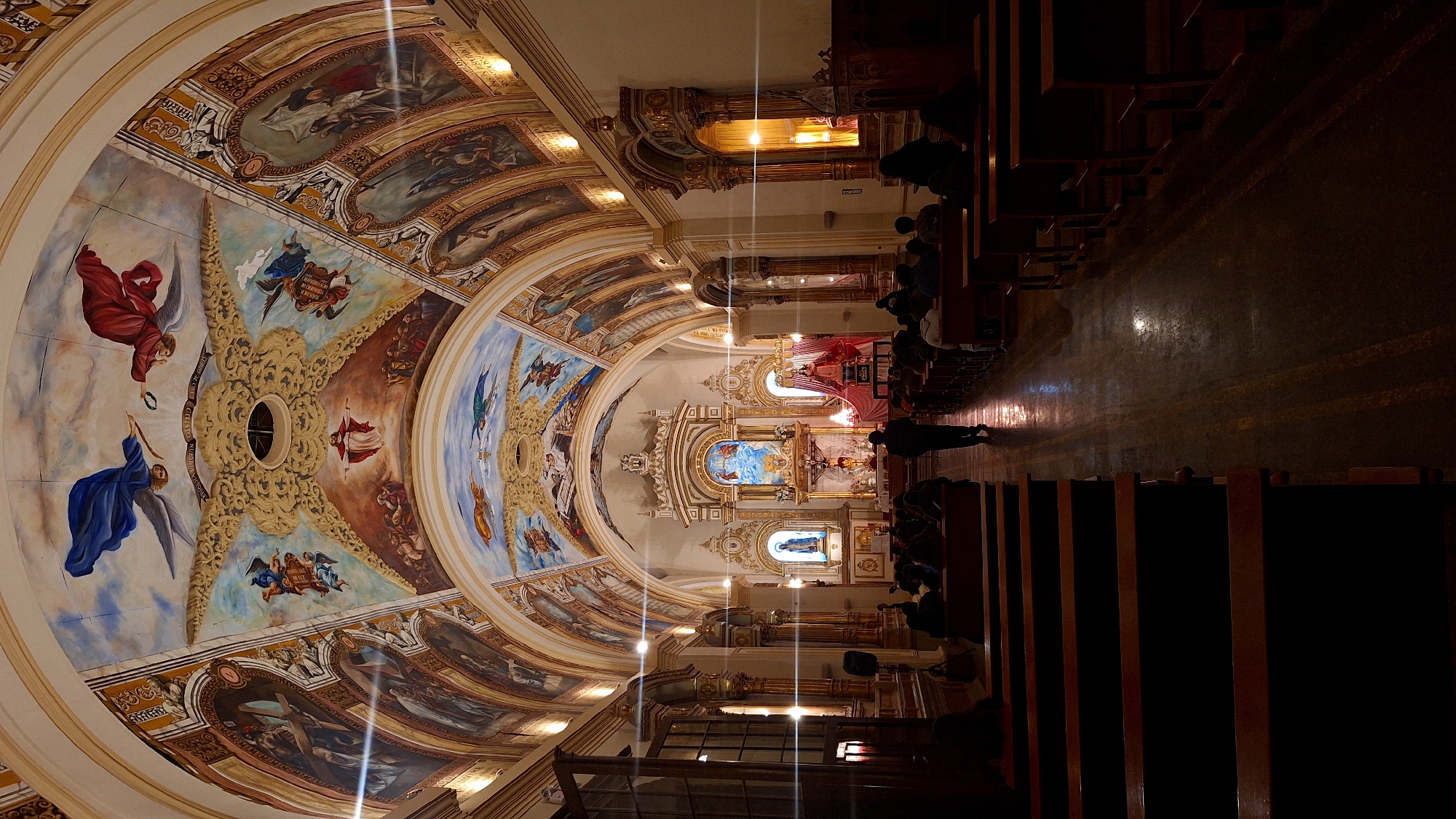 Evening piano performance in ornate Arequipa church