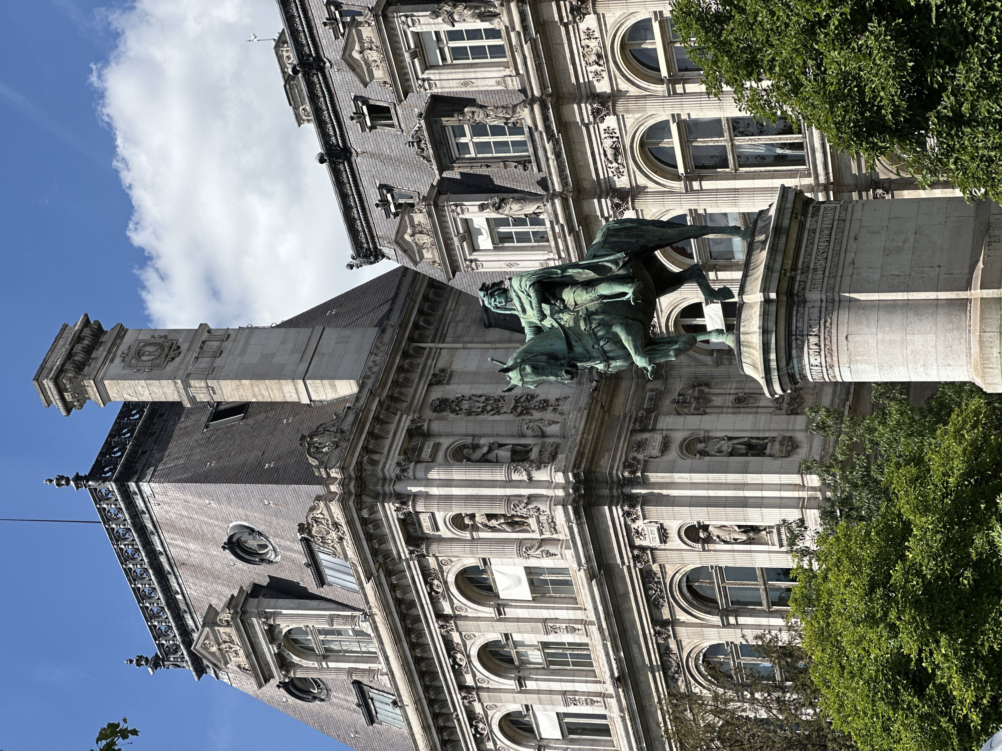 Tourist documents central Paris landmarks including covered Pont Neuf bridge