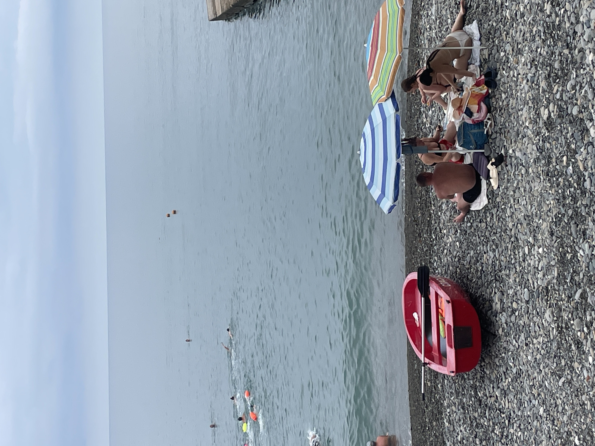 Summer morning on Sochi's Black Sea pebble beach