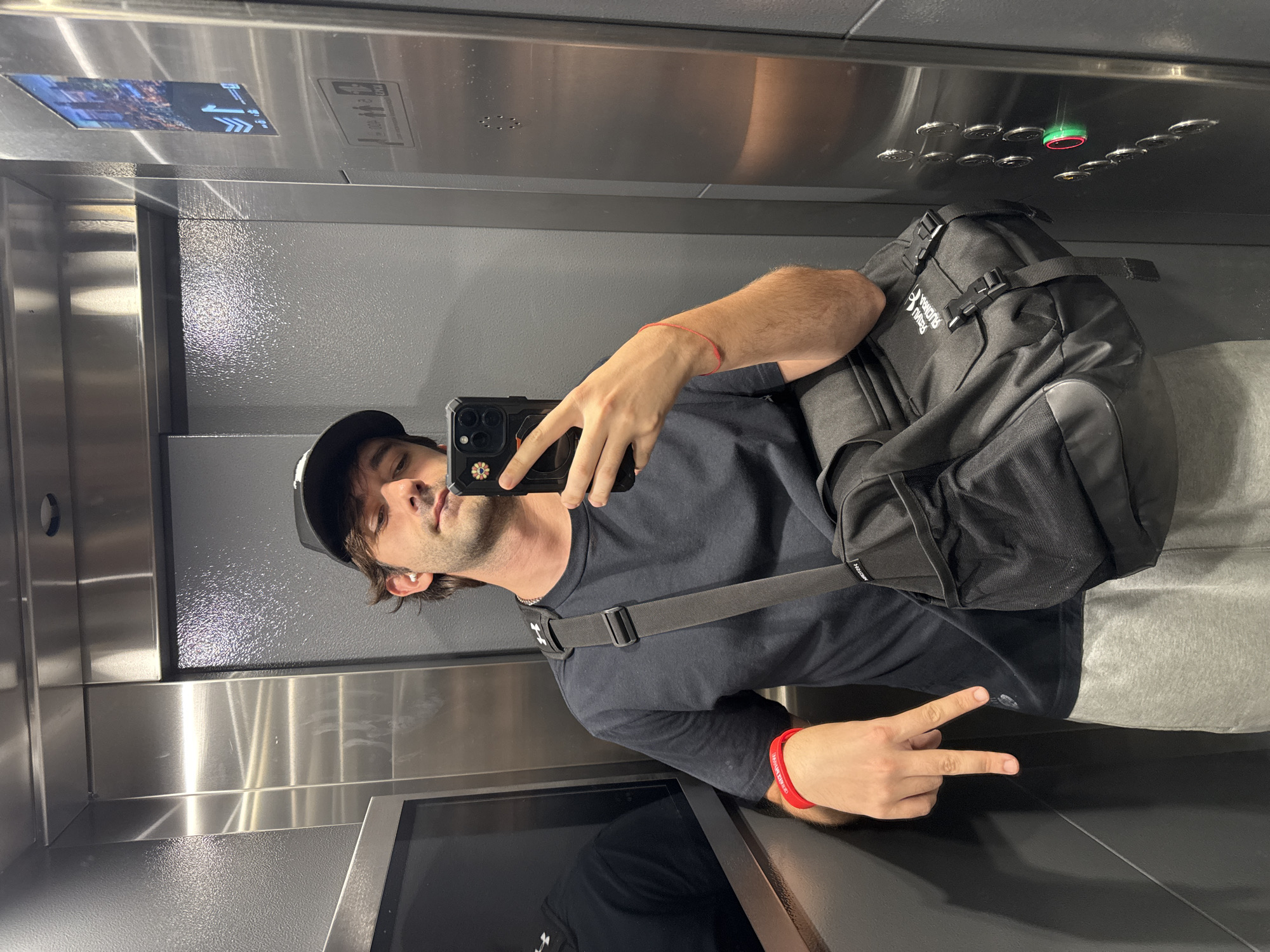 Elevator selfie with crossbody bag, Moscow