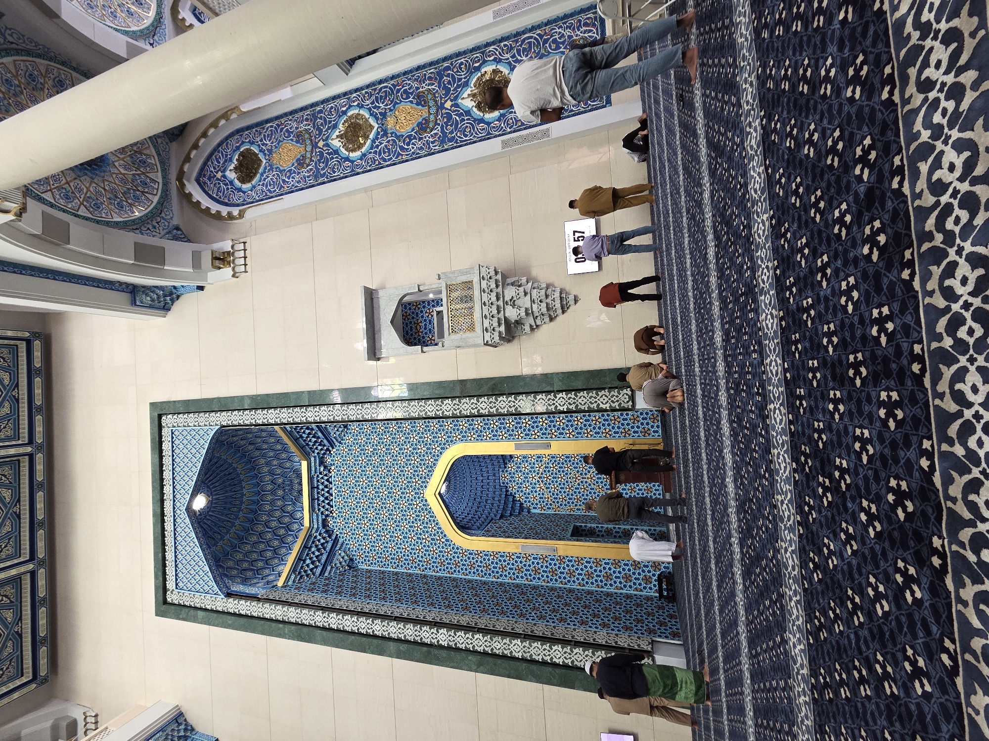 Prayer and daily rituals inside an ornate mosque