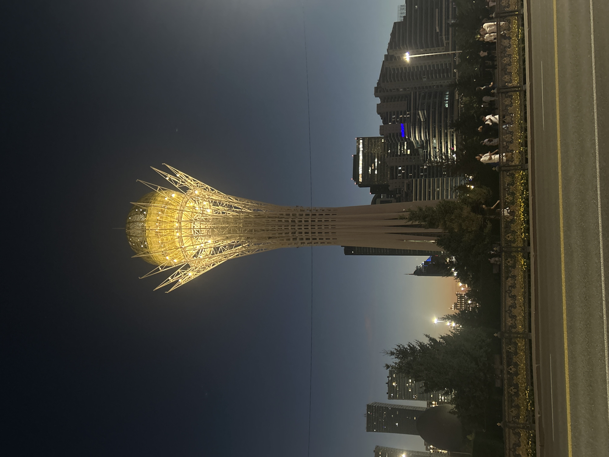 Astana's city center lit up at dusk