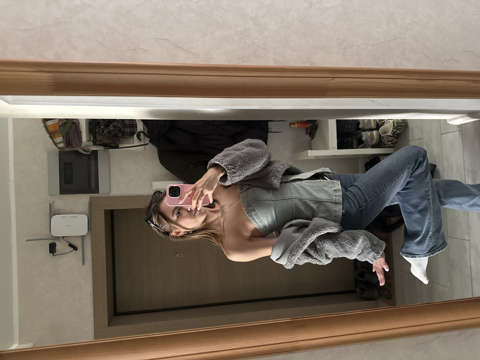 Mirror selfie session in a Moscow apartment, ready to head out
