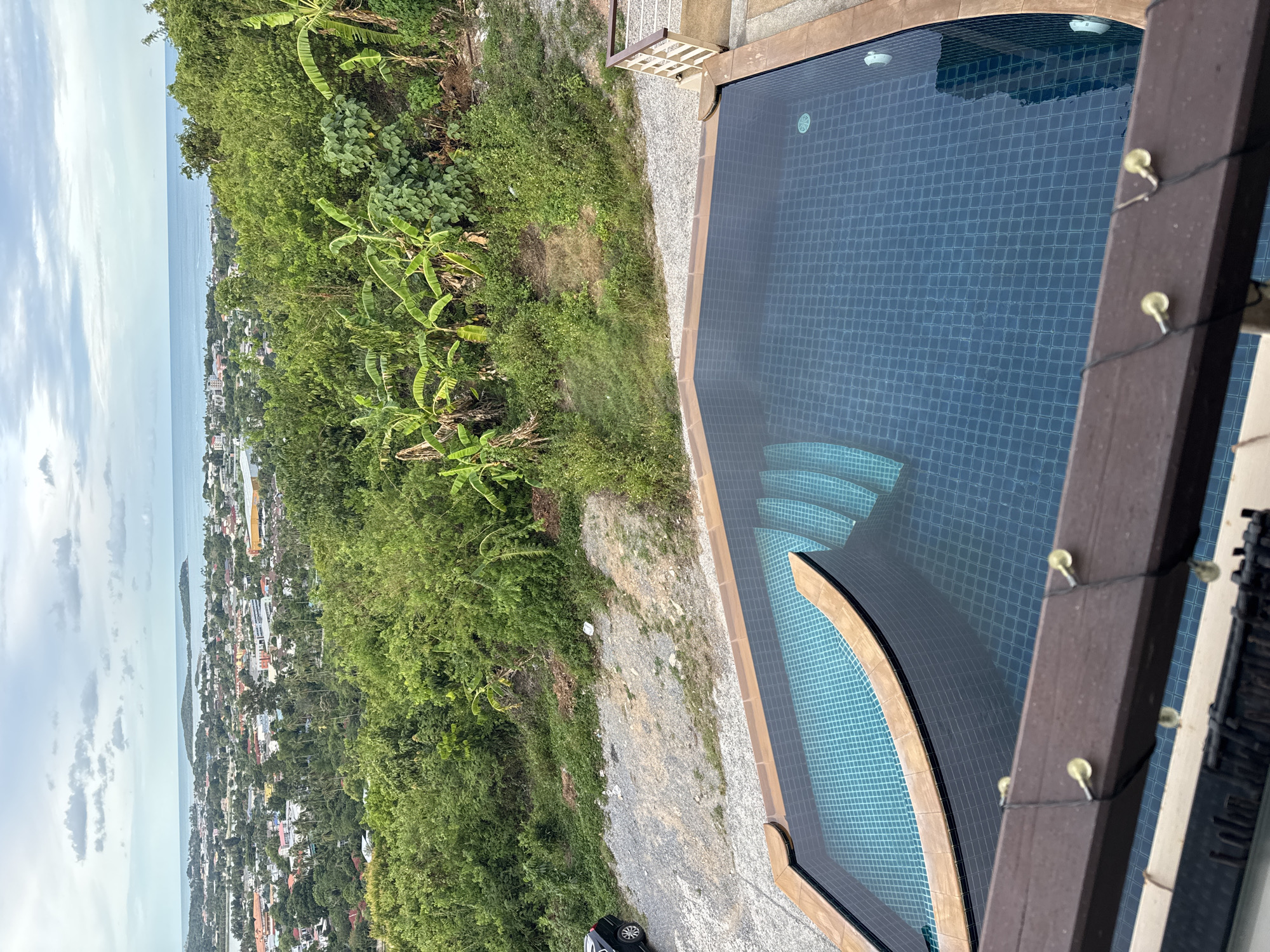 Hilltop balcony life in Ko Samui with coastal views