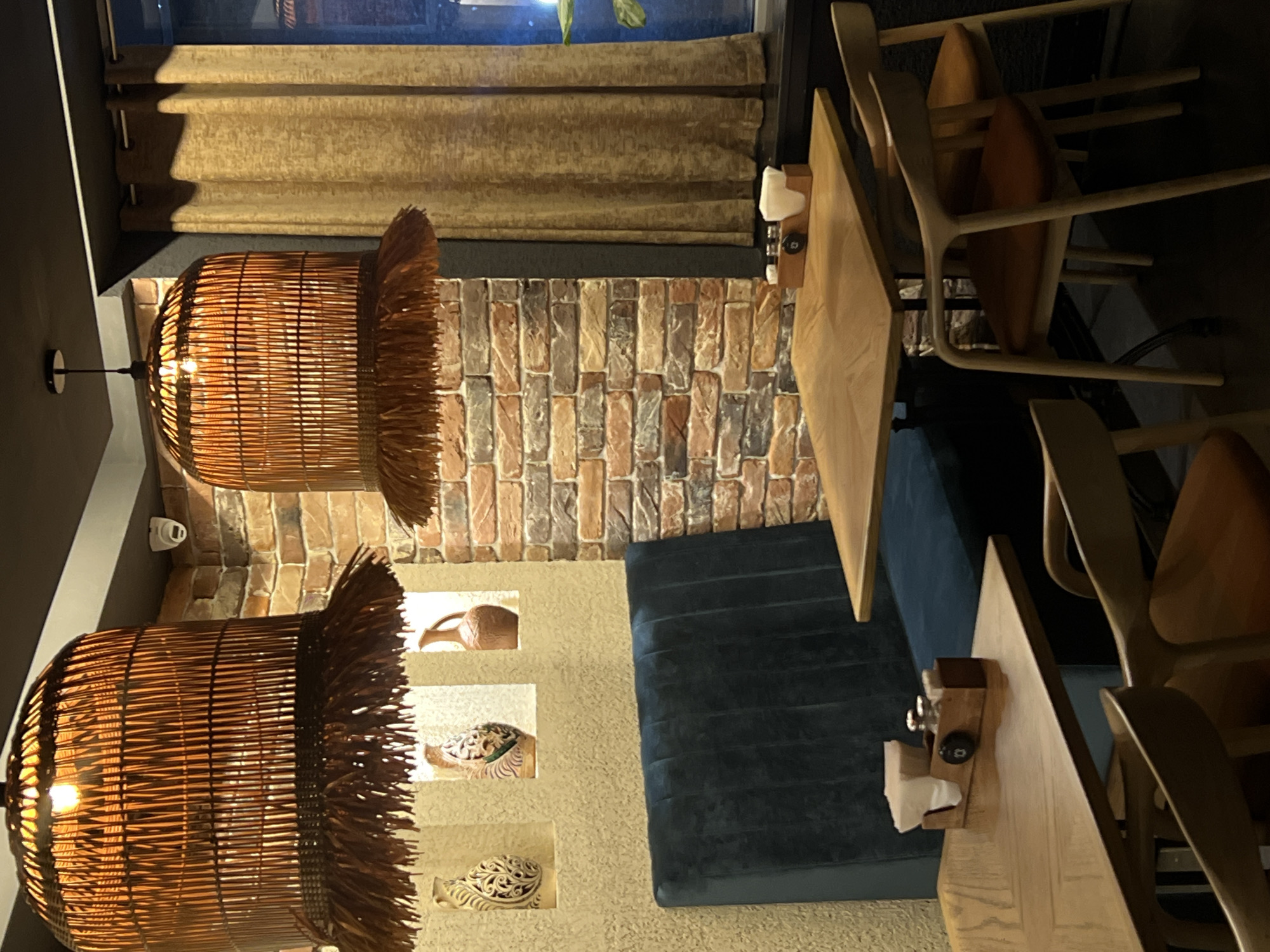 Inside a Moscow restaurant with mixed seating and warm lighting