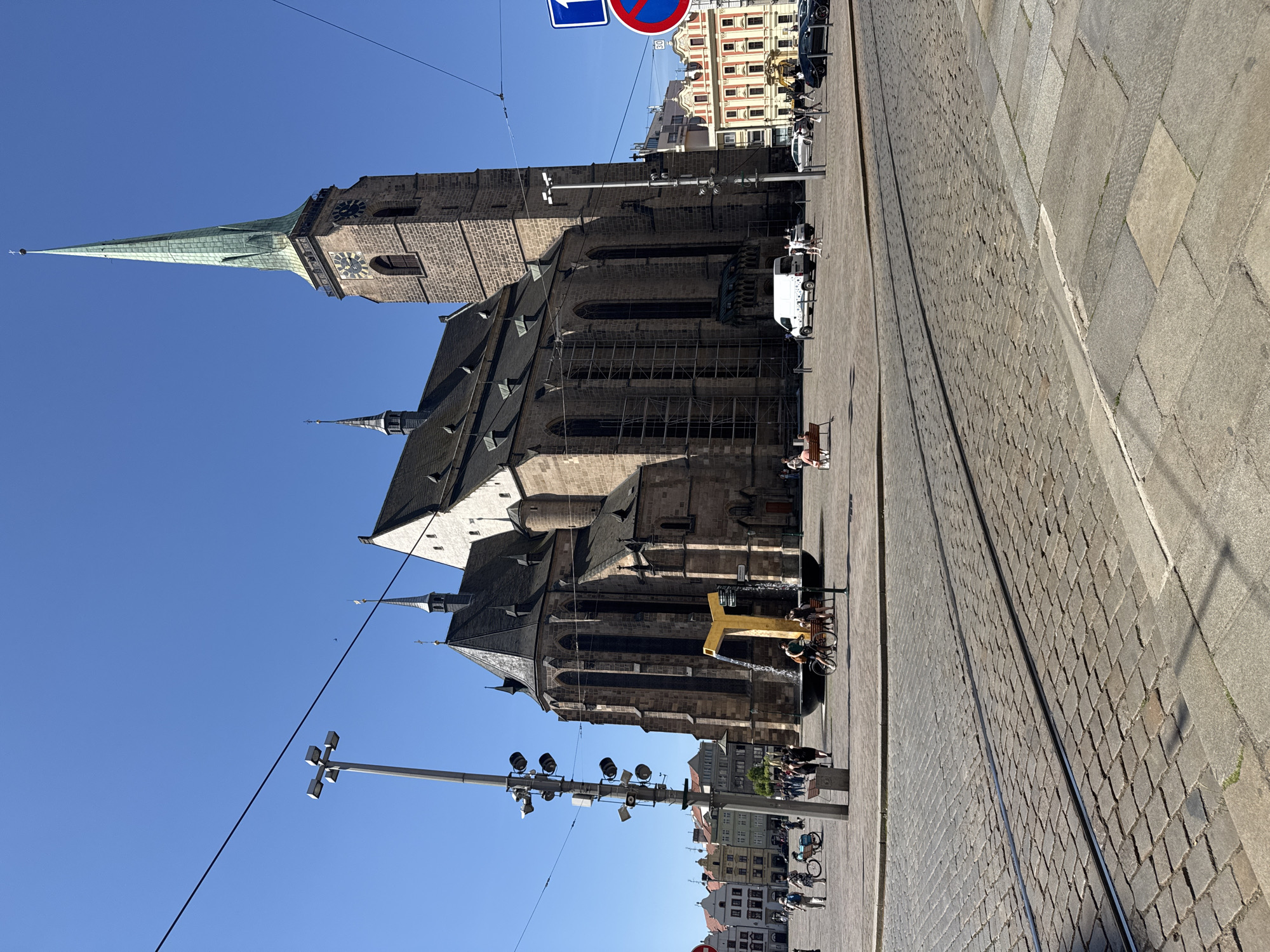 Gothic church renovation and golden fountain documented in Pilsen