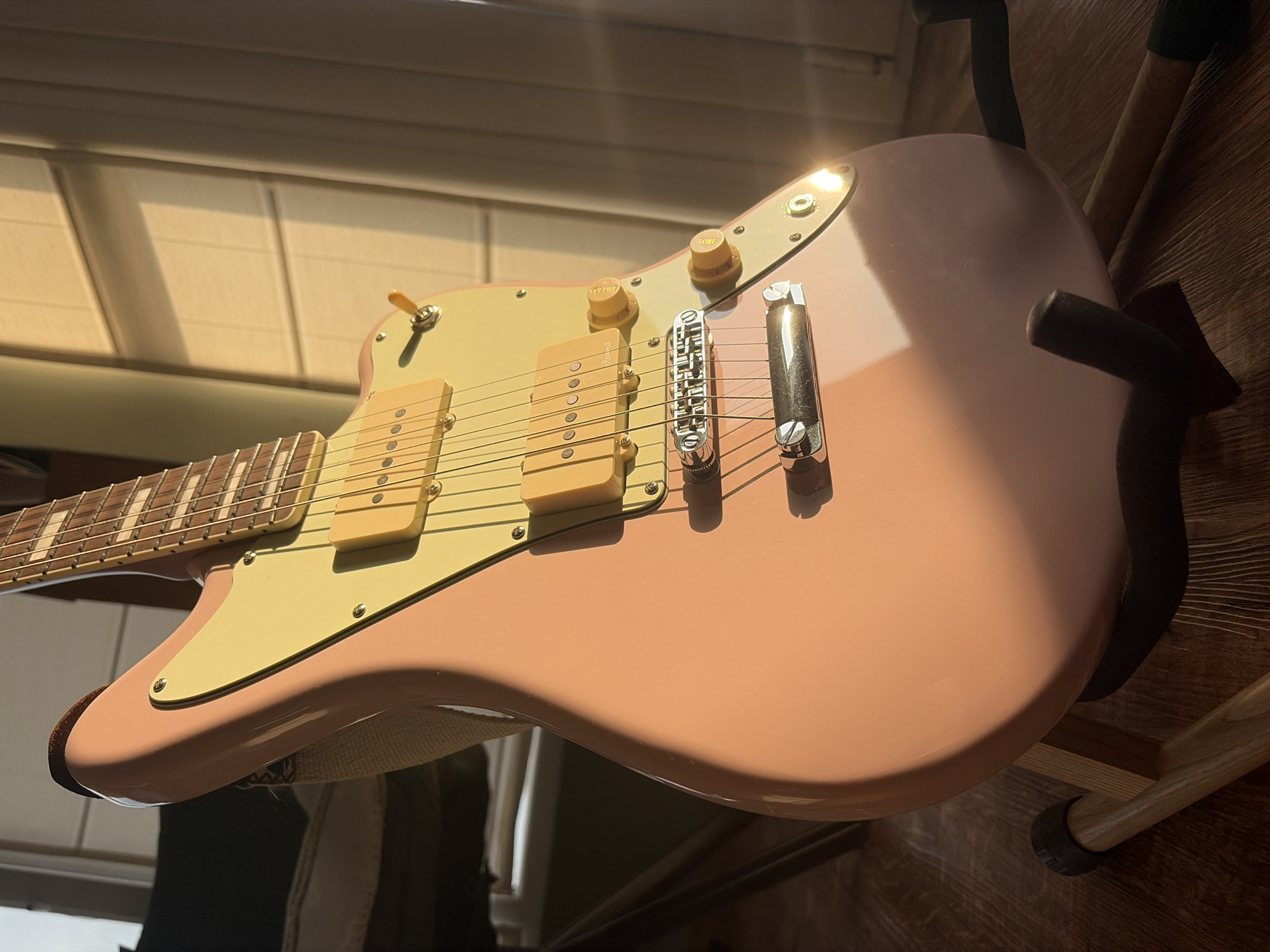 Mixed memories captured: pink guitar, urban sunset, woman portrait