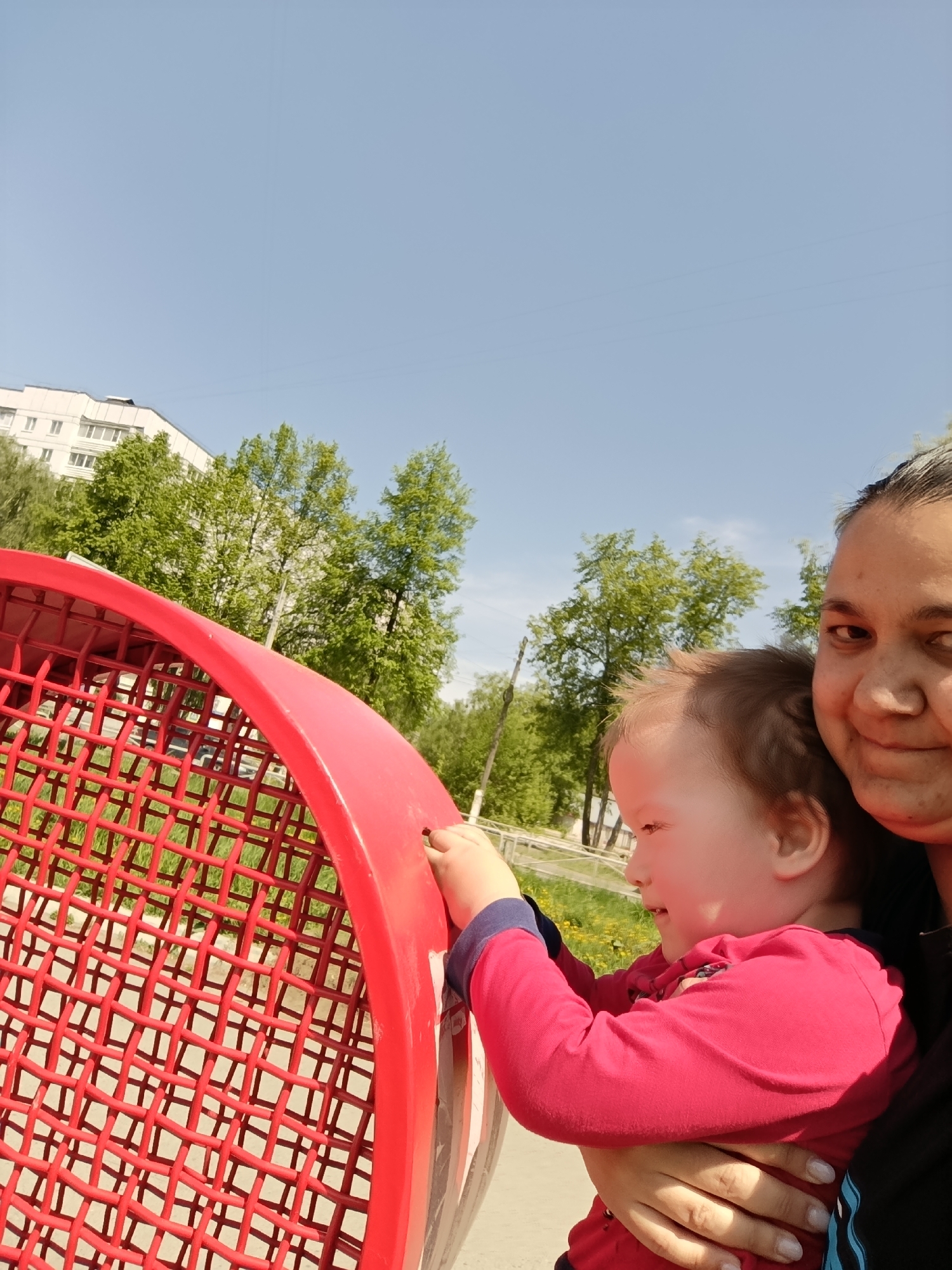 Family participates in recycling initiative at Chaikovsky public square