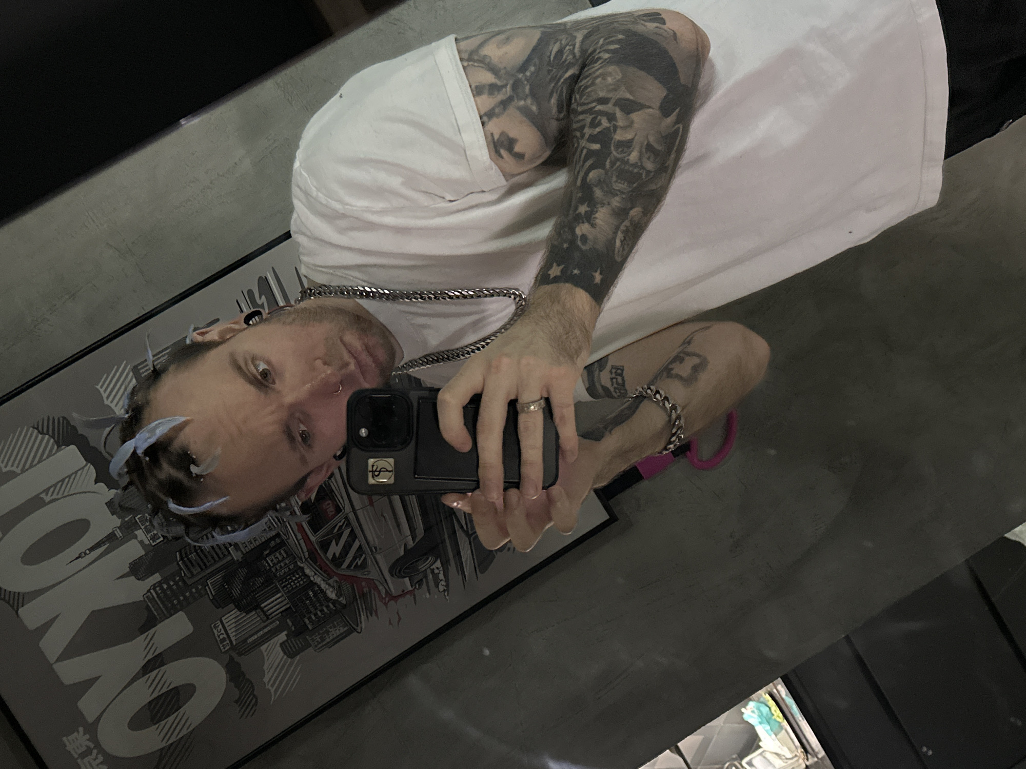 Tattooed man takes selfie in Khimki