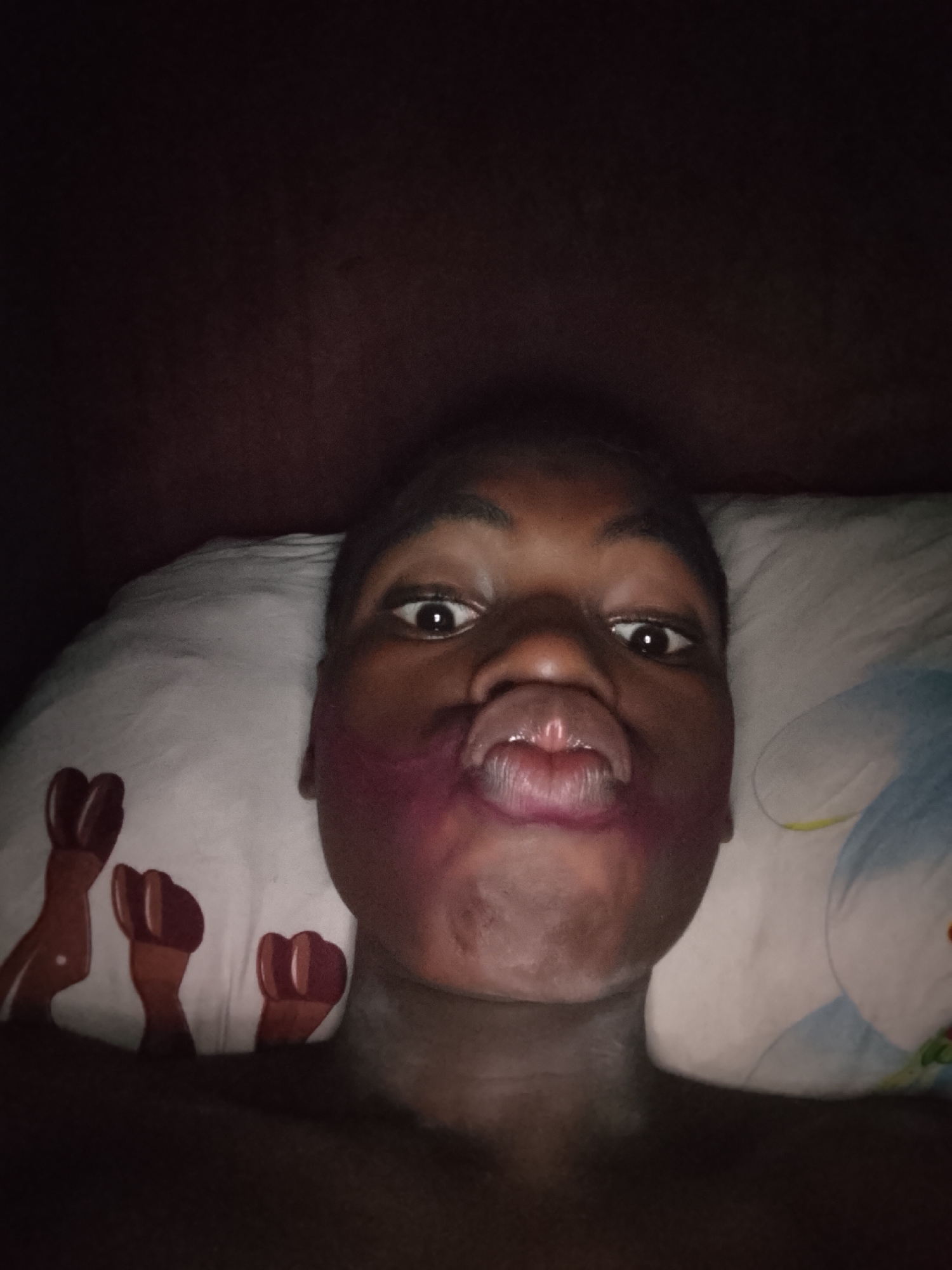 Person takes multiple selfies with purple makeup over 20 minutes