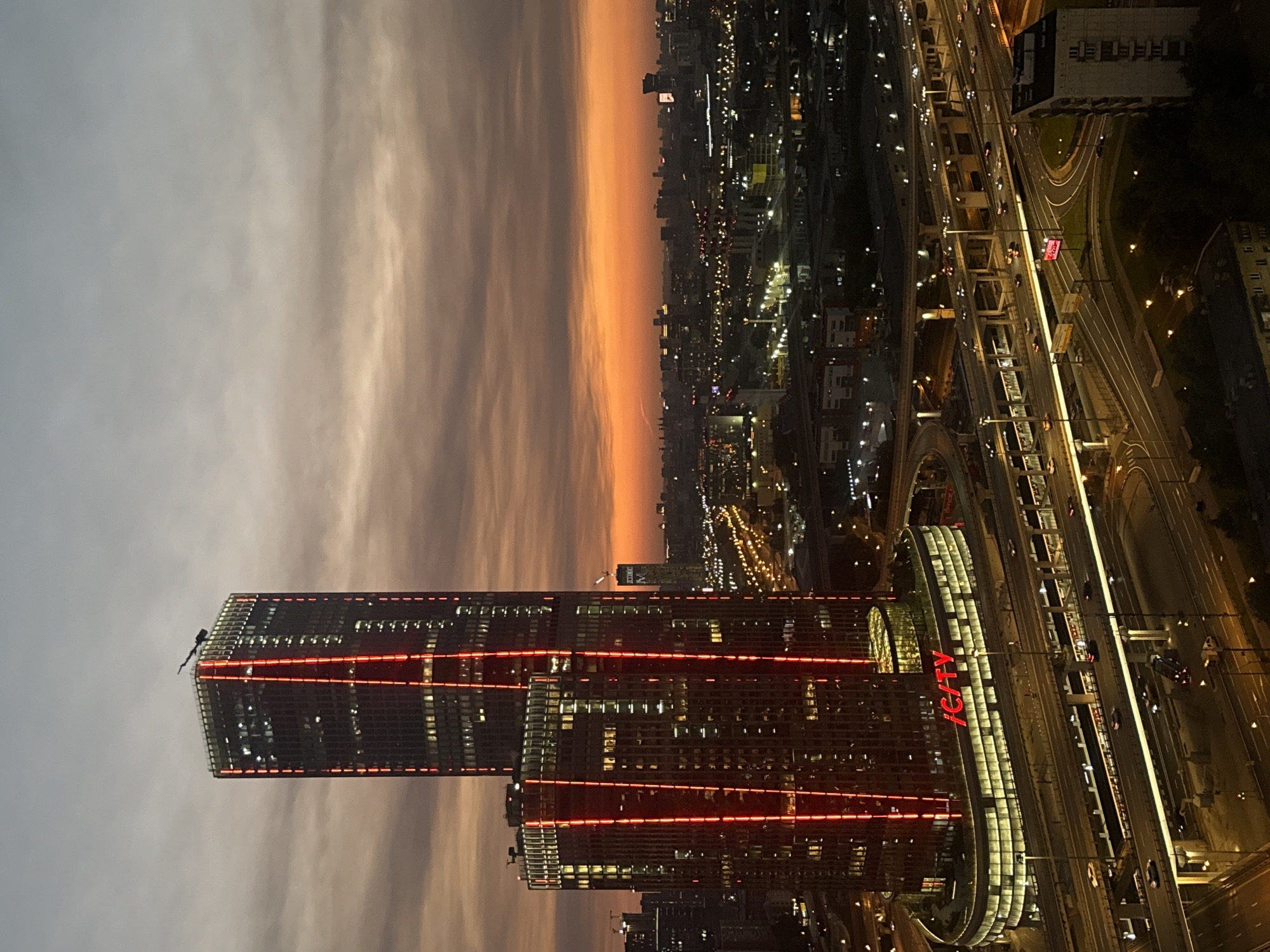 Khimki's iCITY tower lights up a summer evening