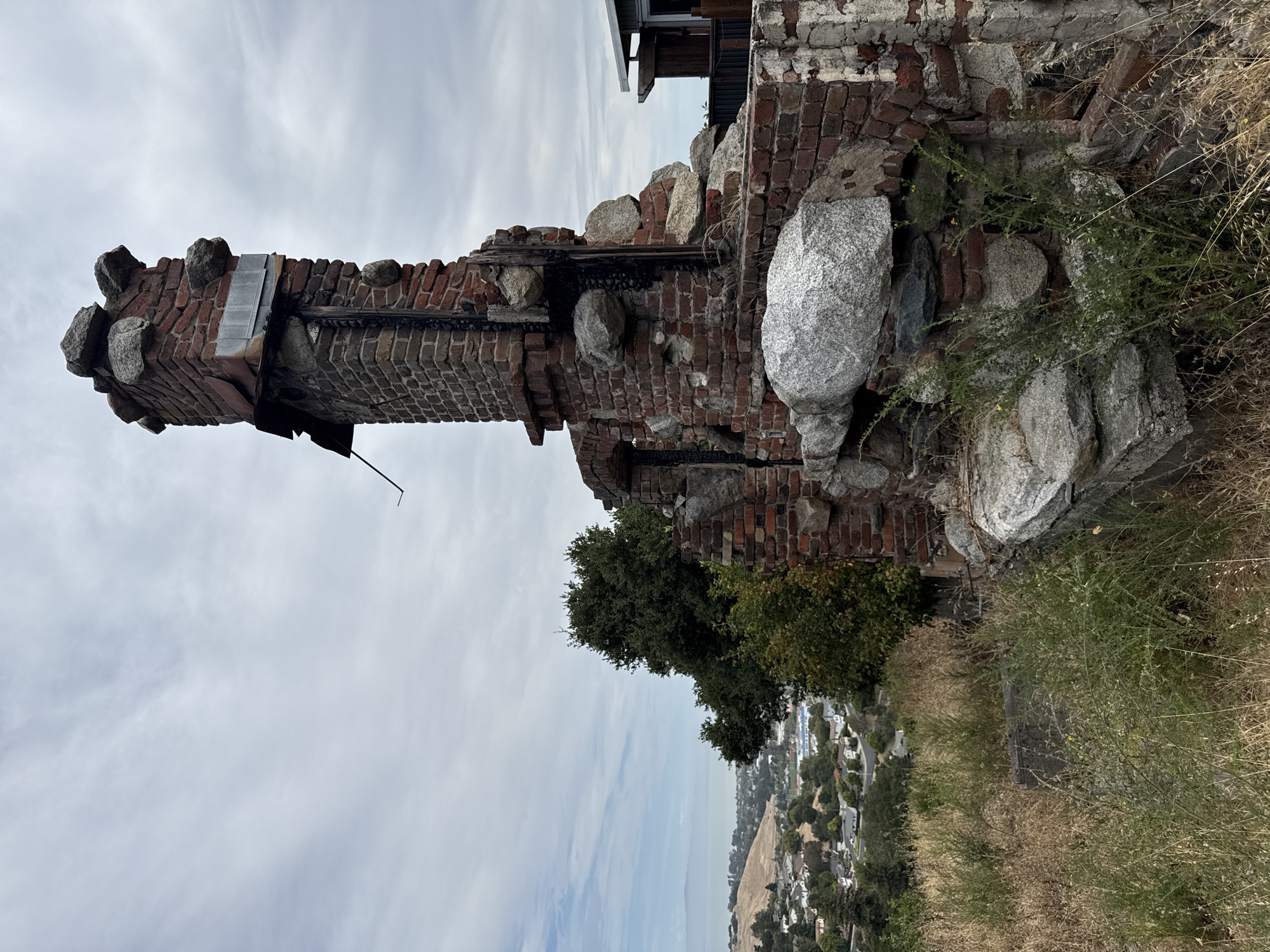 Ruined hilltop chimney overlooks El Sobrante suburbs