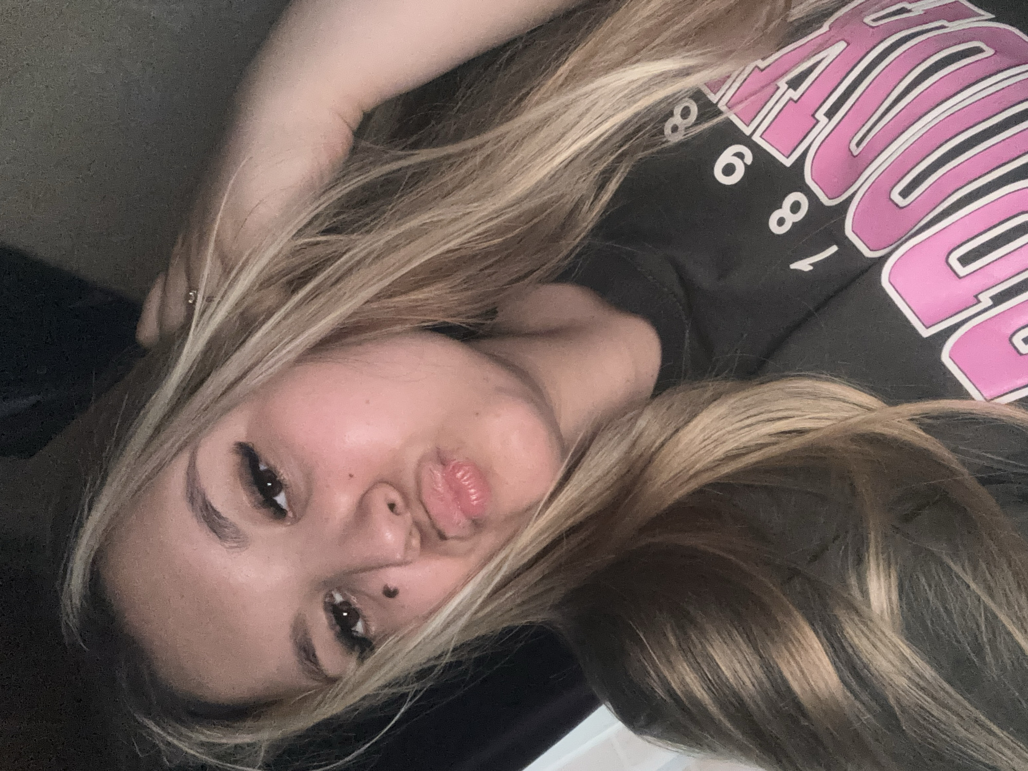 Woman takes selfies in Russian village wearing Brooklyn shirt