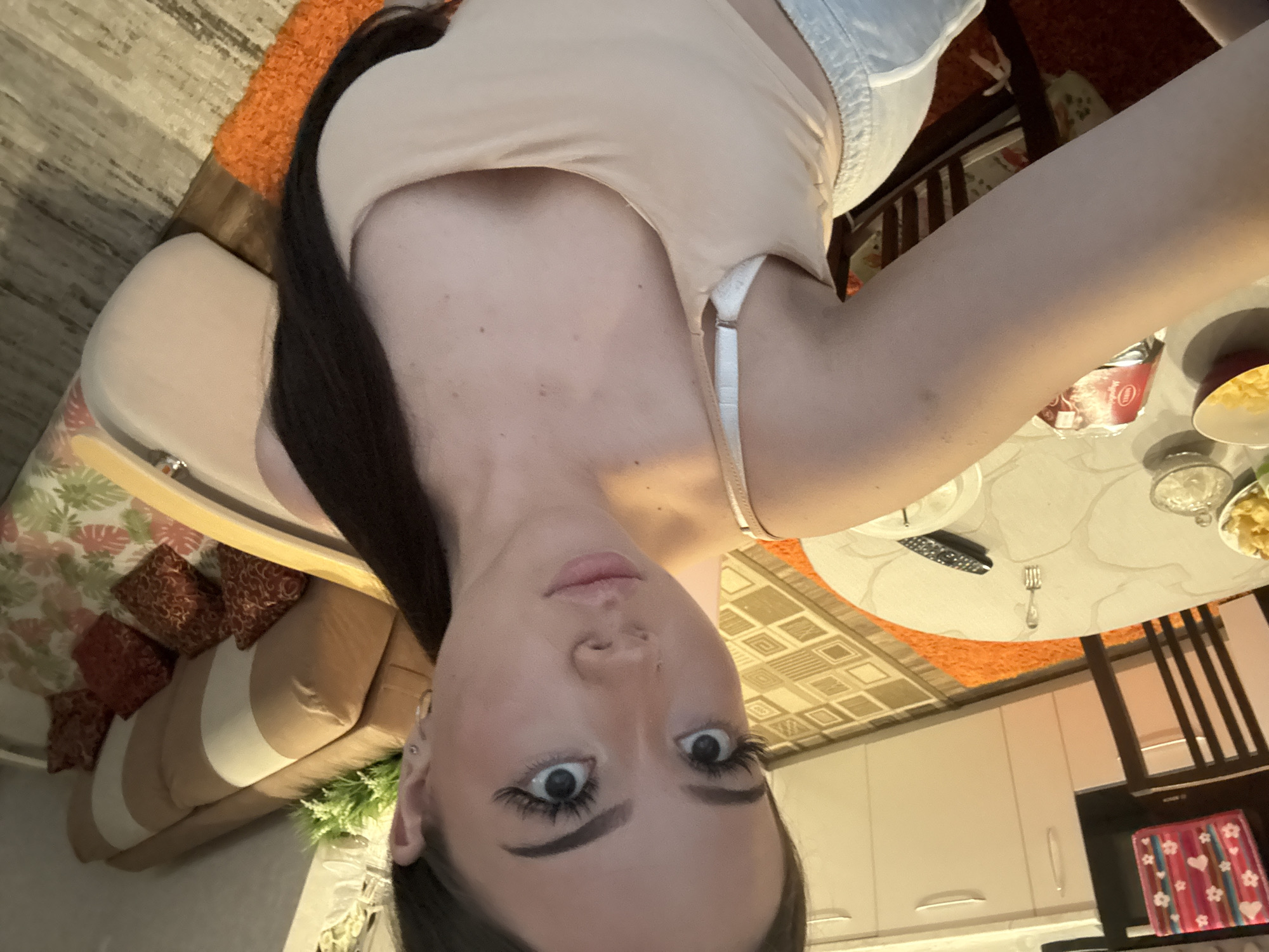 Woman takes multiple selfies at home in Naberezhnye Chelny