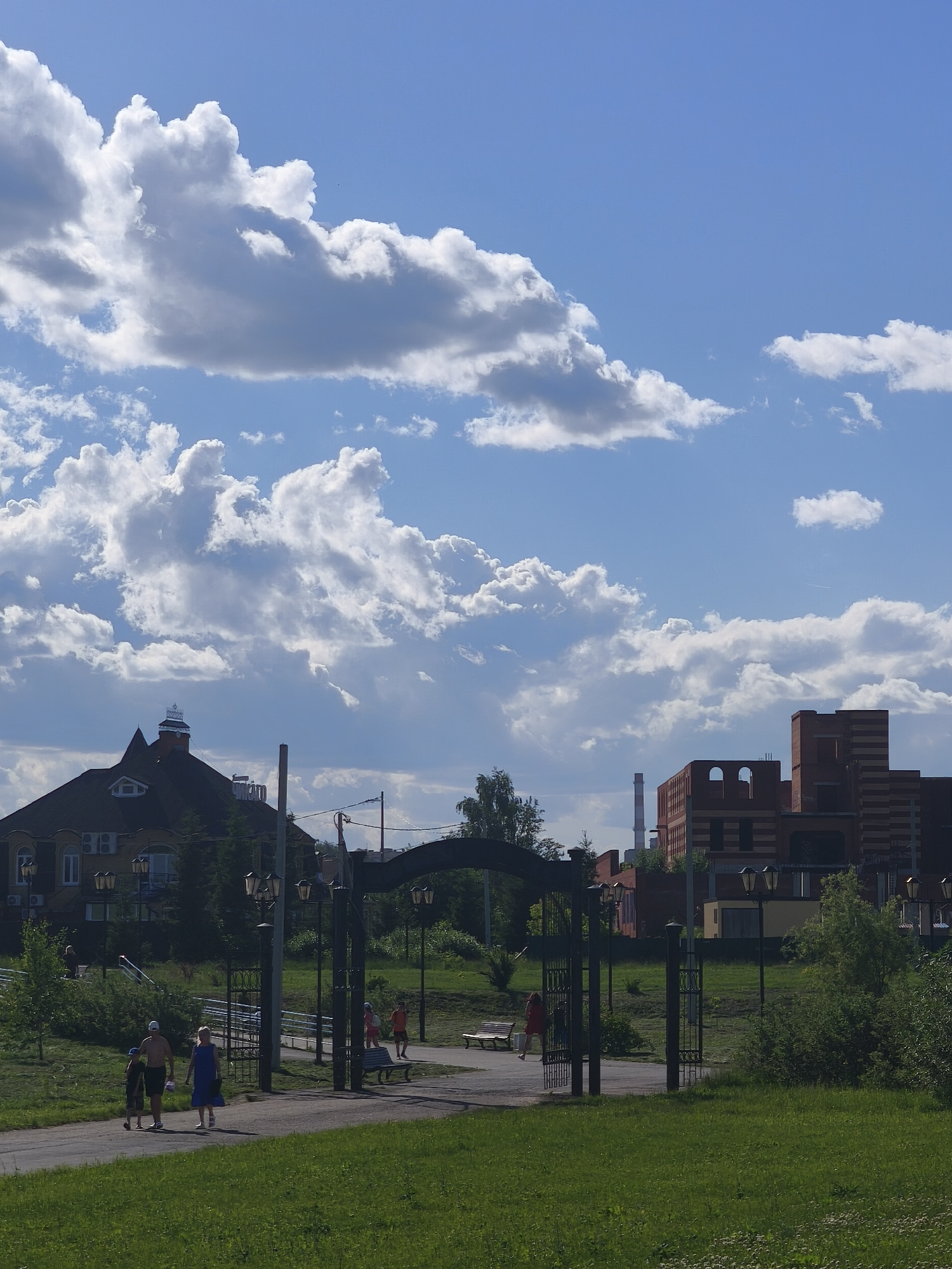 Park visitor documents sculptures and recreation in Yoshkar-Ola