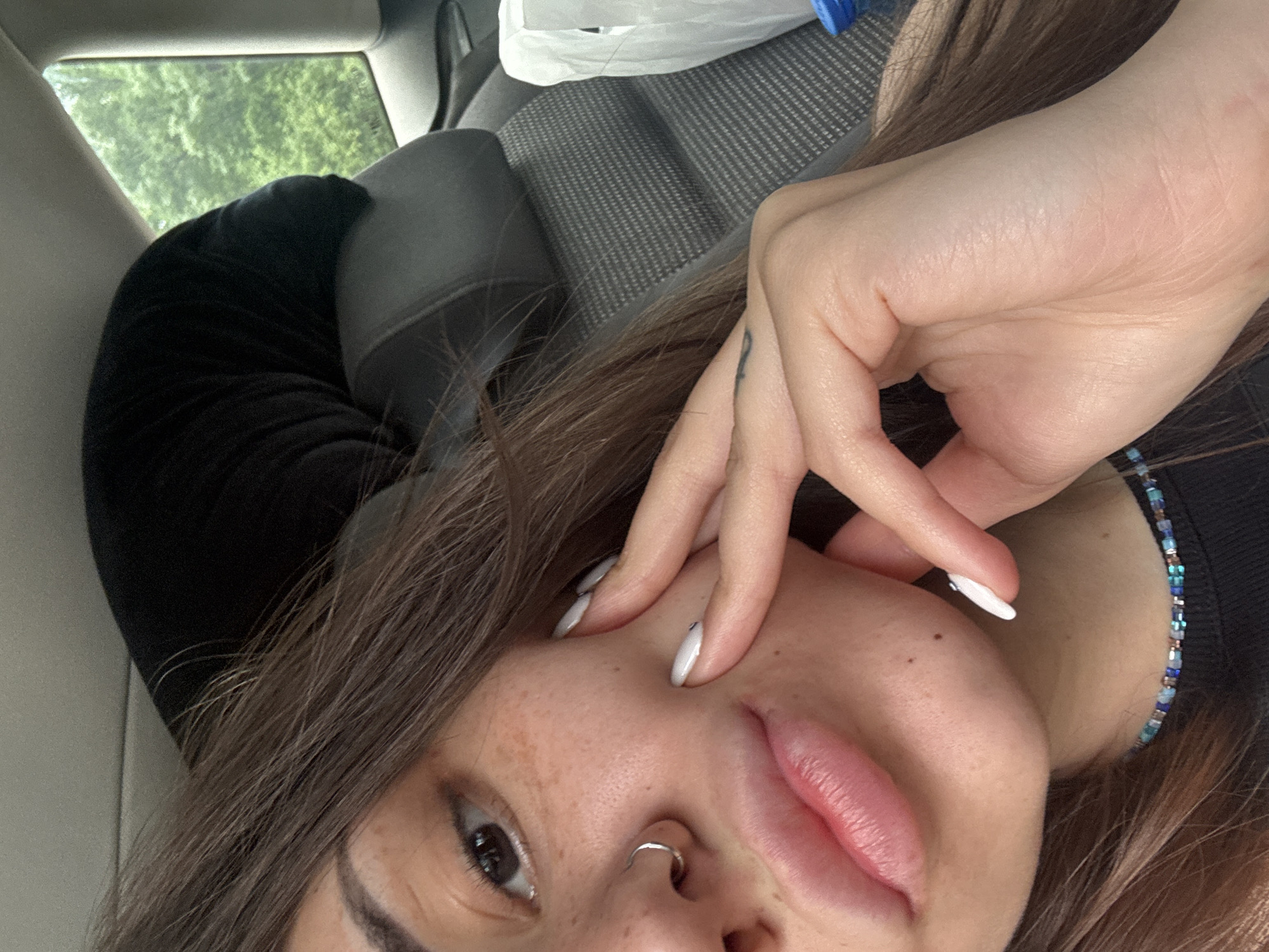 Woman Takes Selfies in Car in Sofia