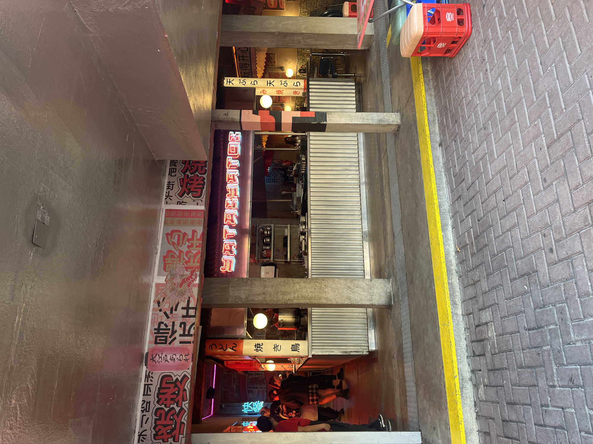 Evening activity captured in Buenos Aires Japanese restaurant alley