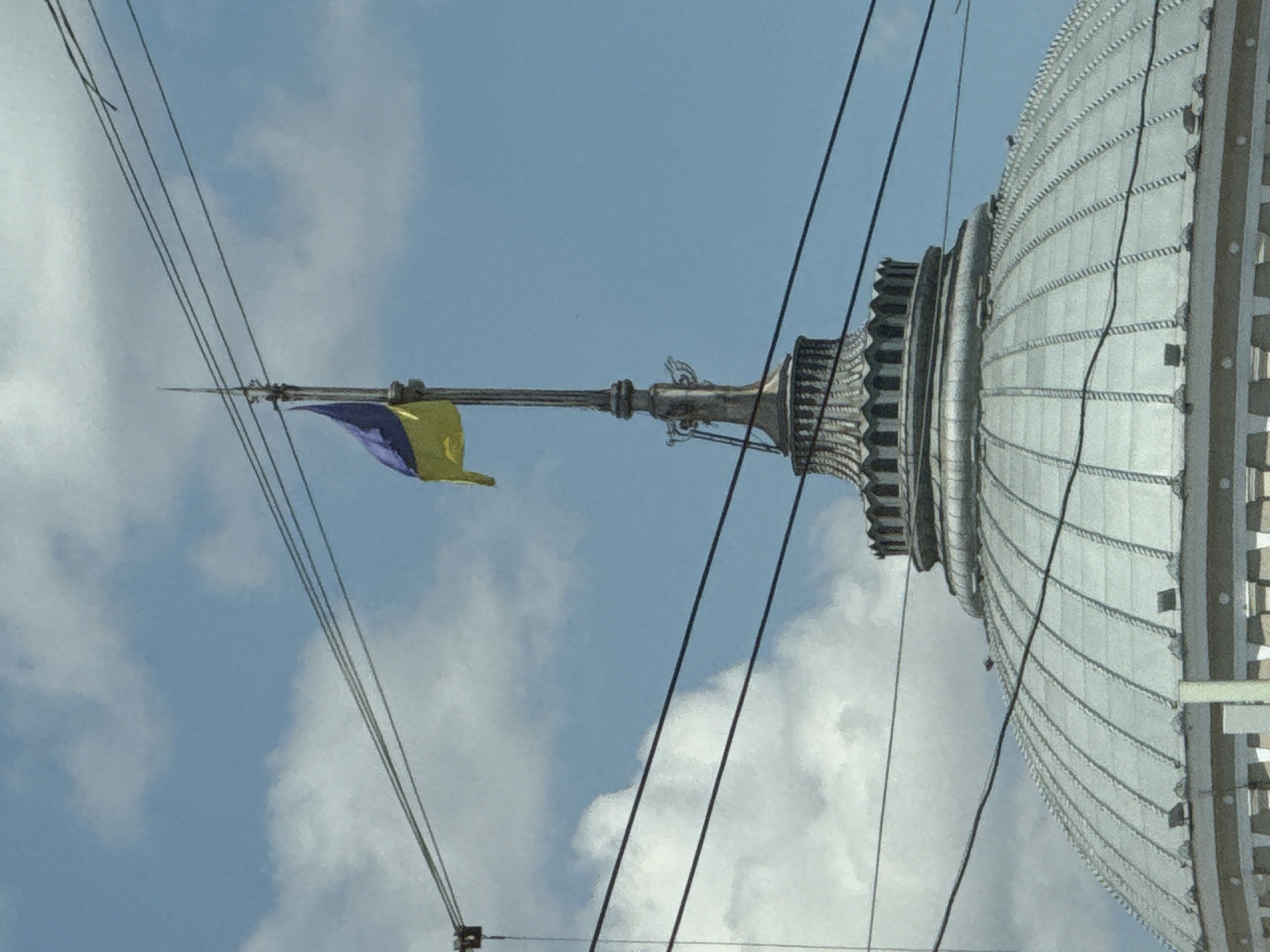Ukrainian flag flies over a rooftop in Odesa