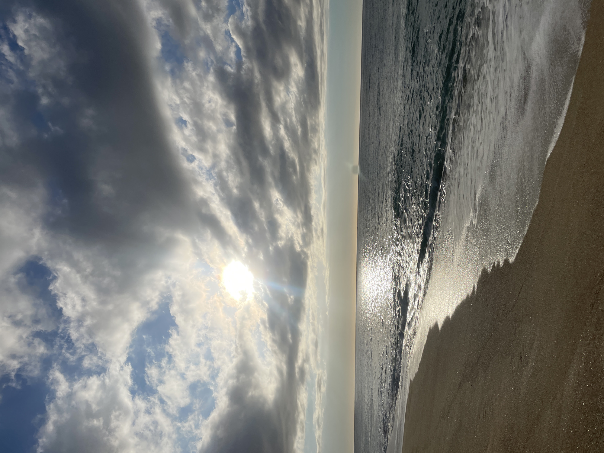 Man enjoys early morning moment at Canet de Mar beach