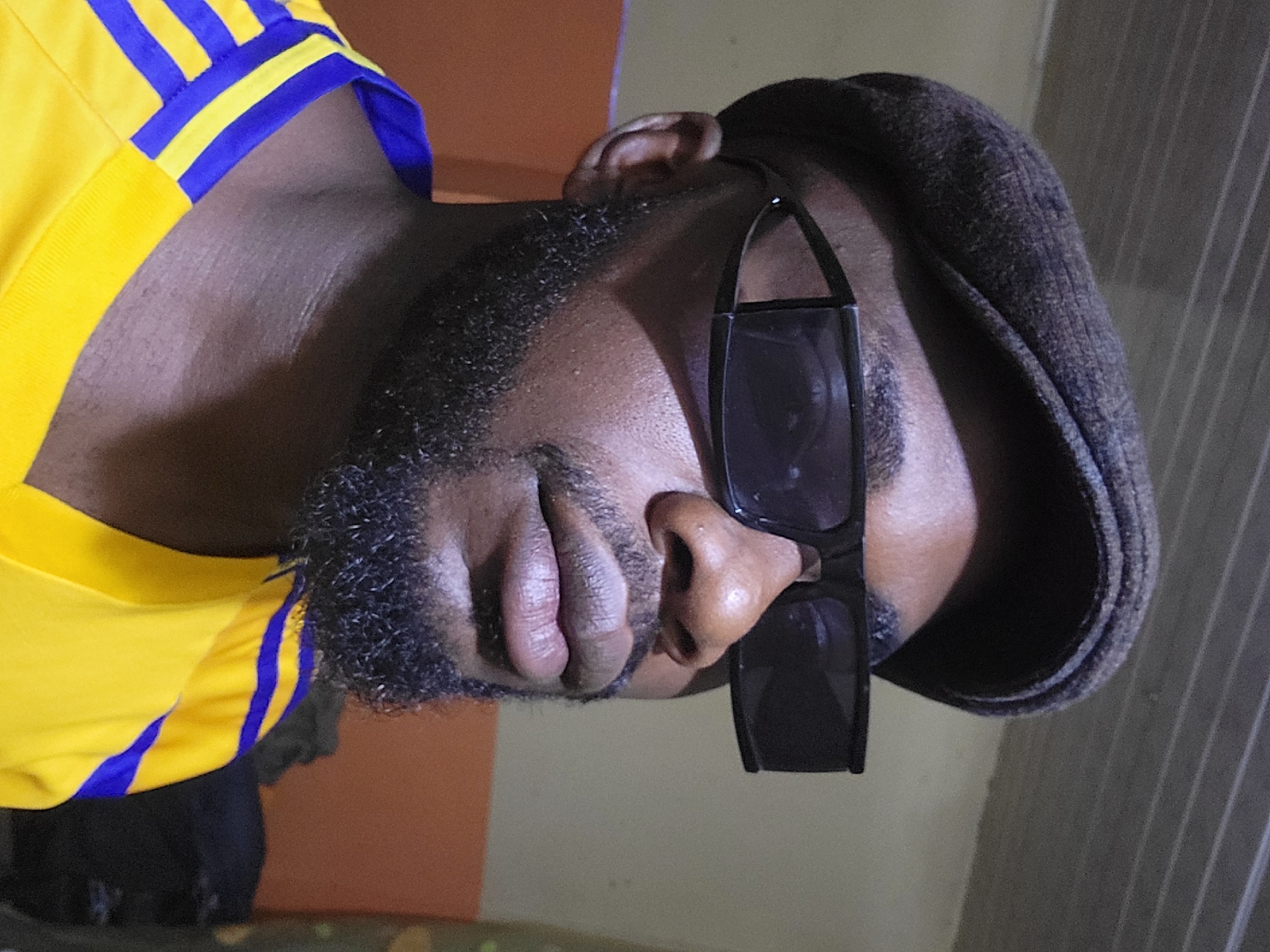 Man in sports jersey photographed multiple times in Jos