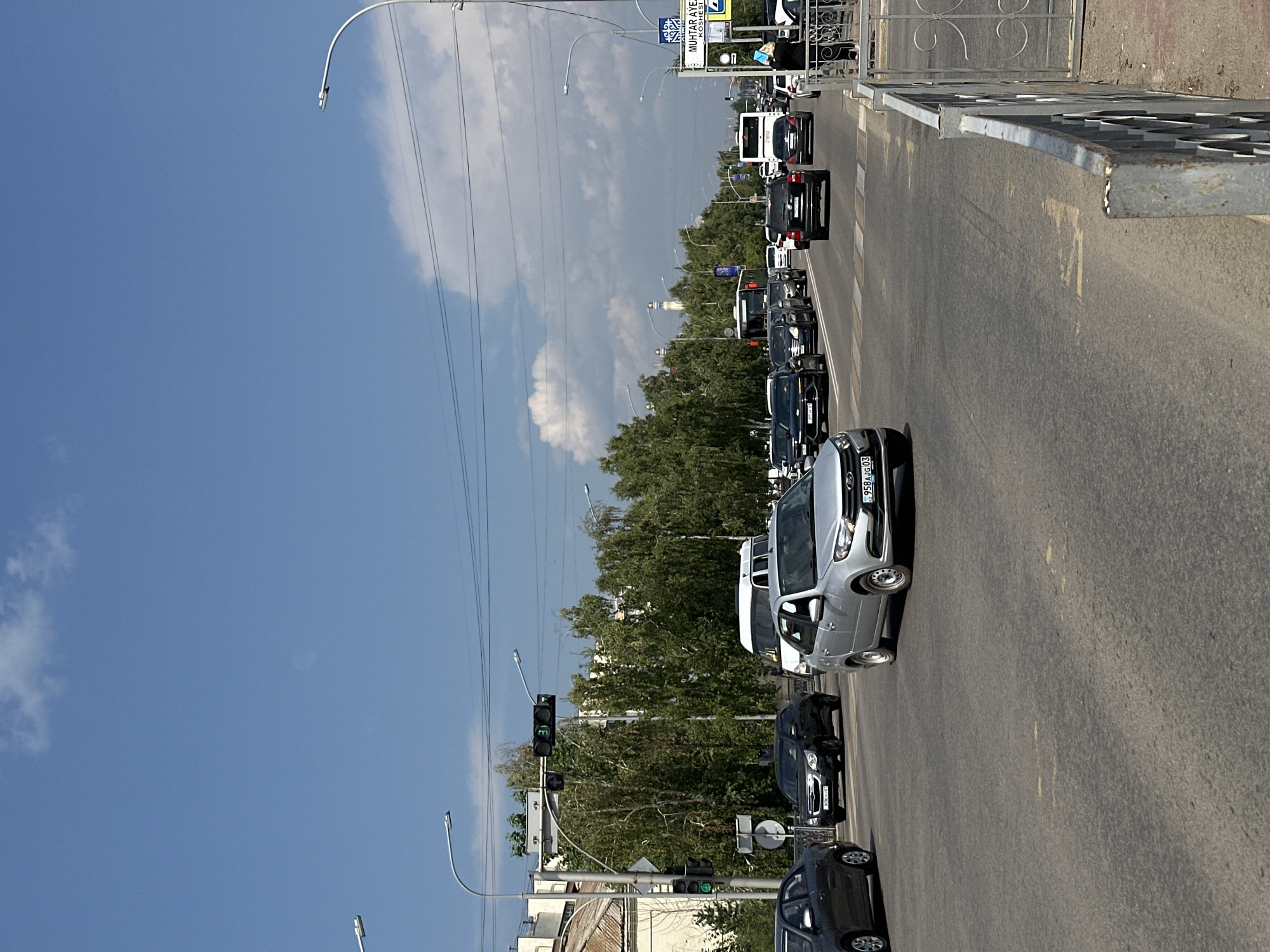 Clear day at a central Kokshetau street intersection