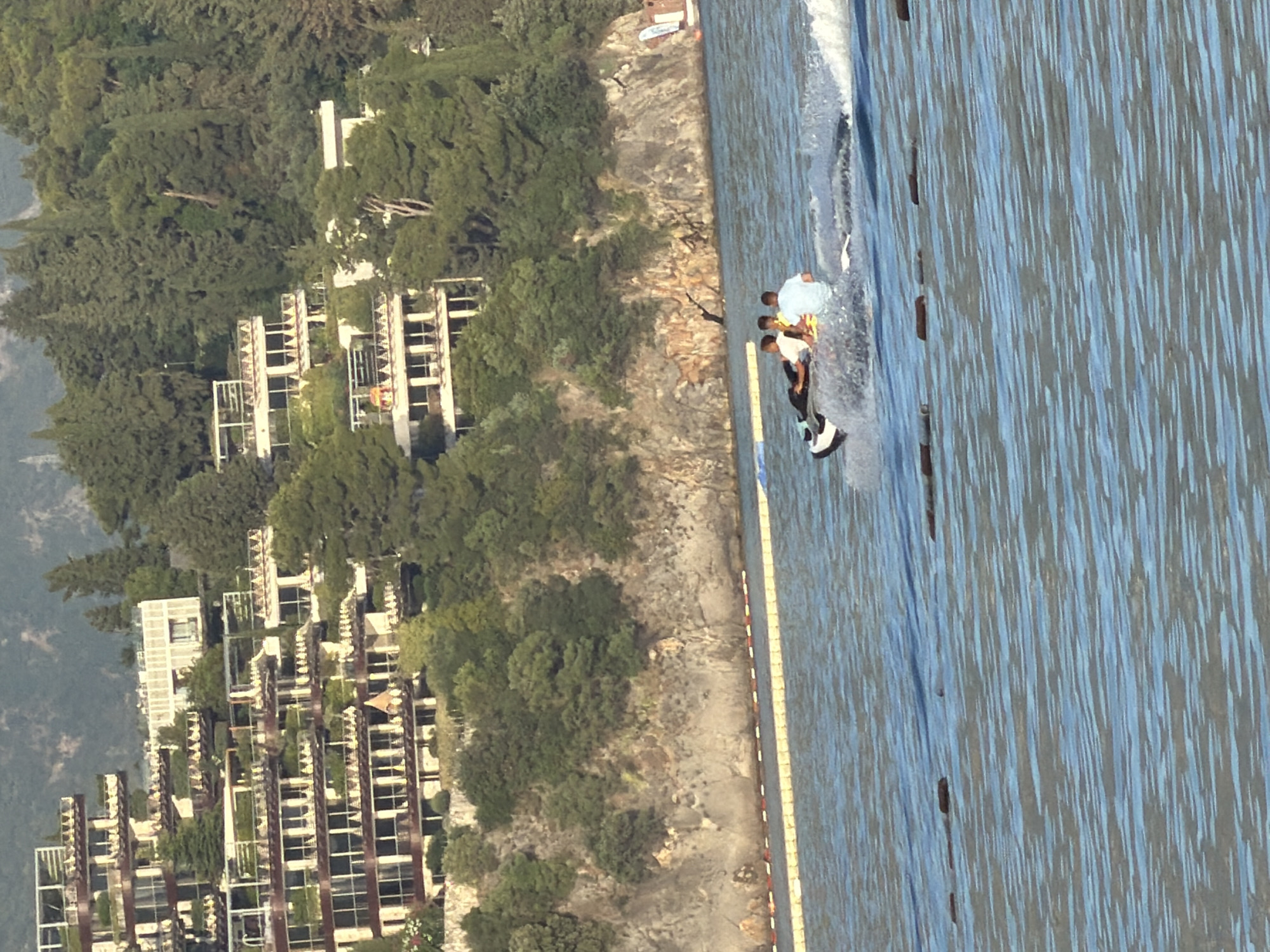 Jet skiers, boats enjoy calm waters off Budva coast