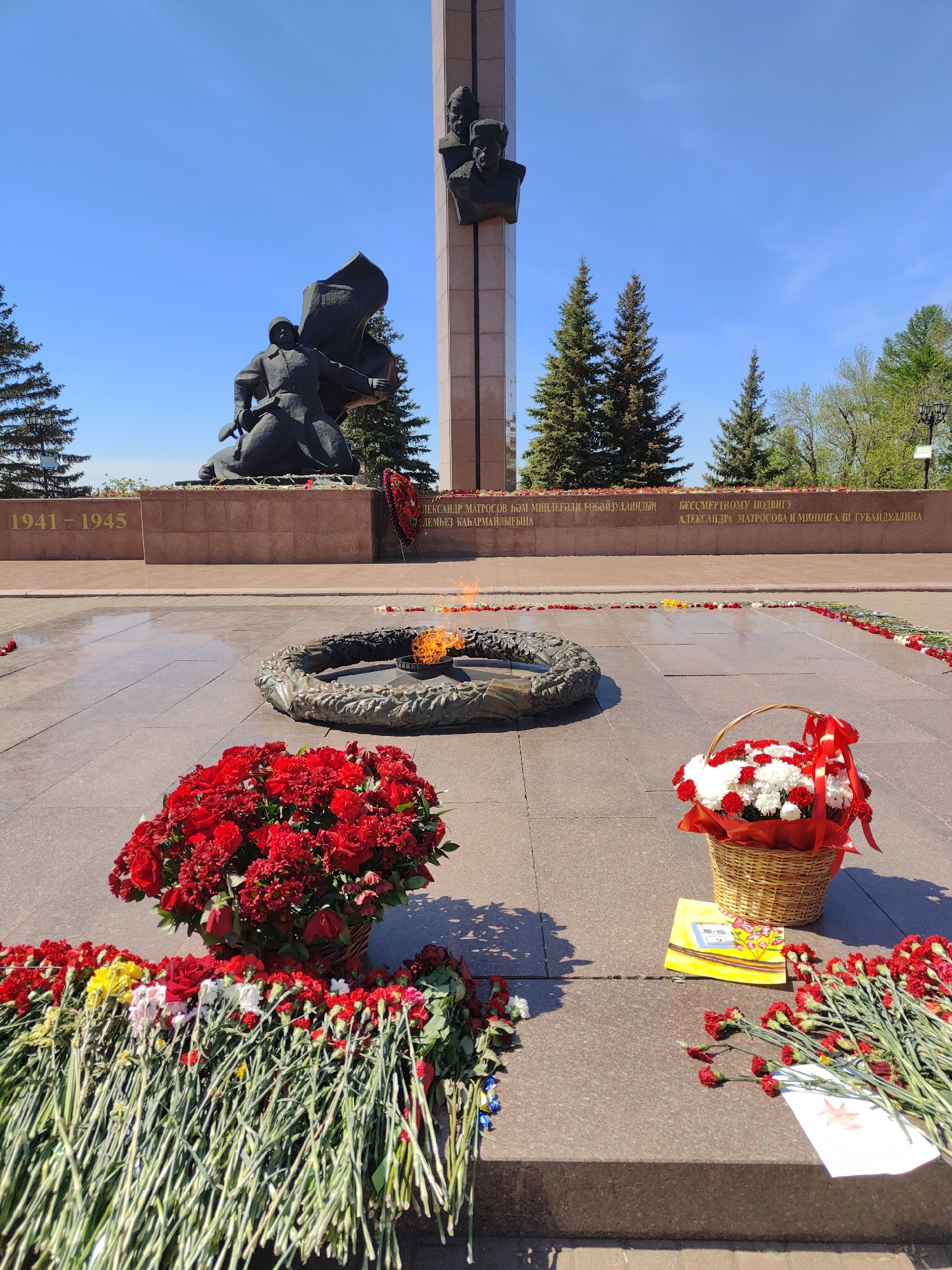 Spring flowers bloom near Victory Monument war memorial in Ufa