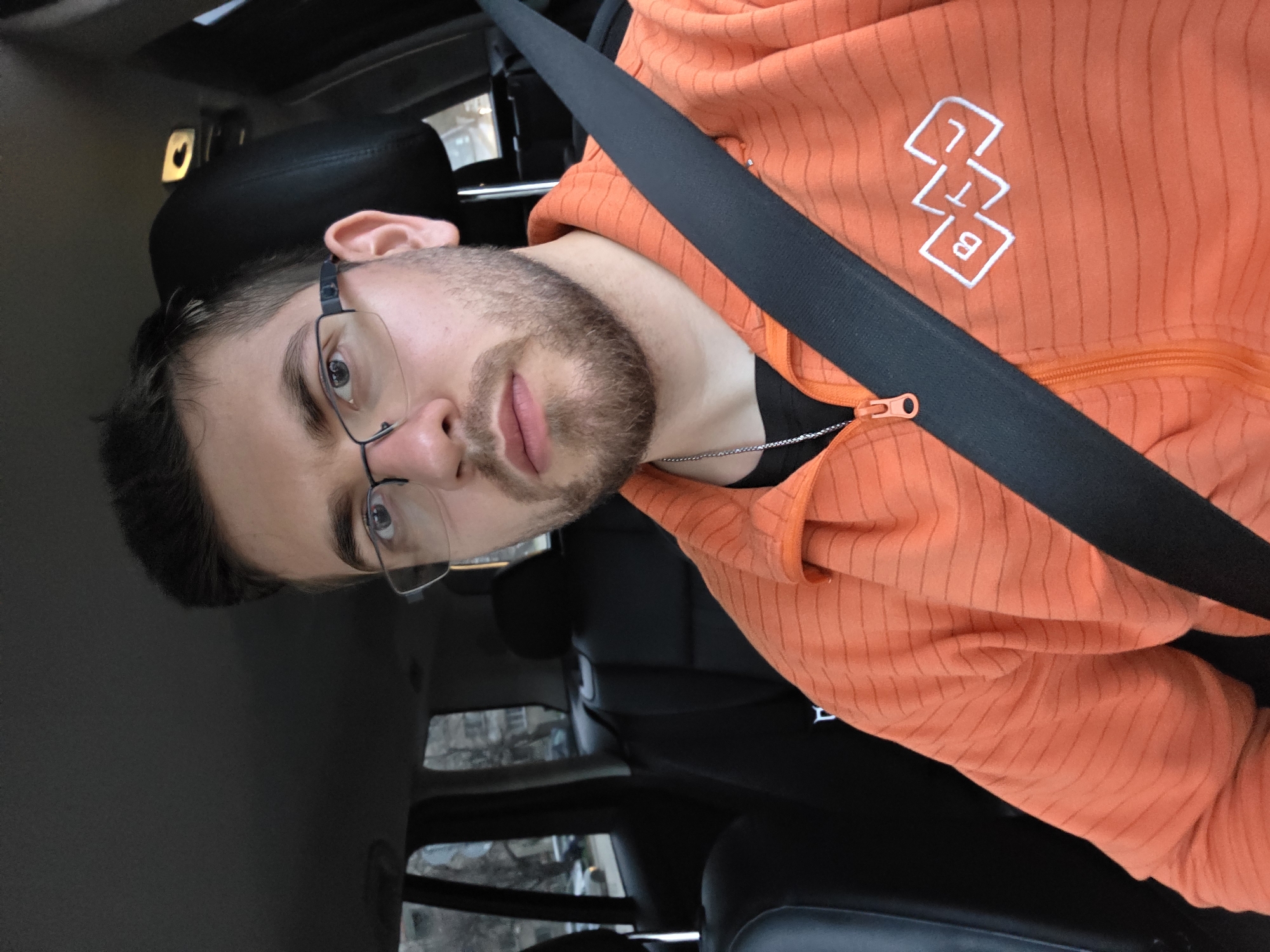 Man in orange hoodie observed sitting in car in Plovdiv