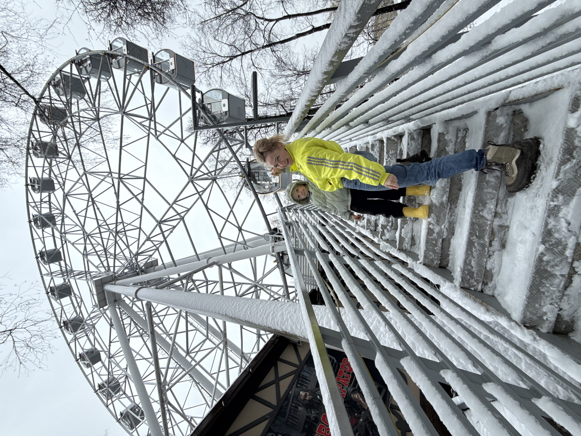 Family visits snowy amusement park in Perm, Russia