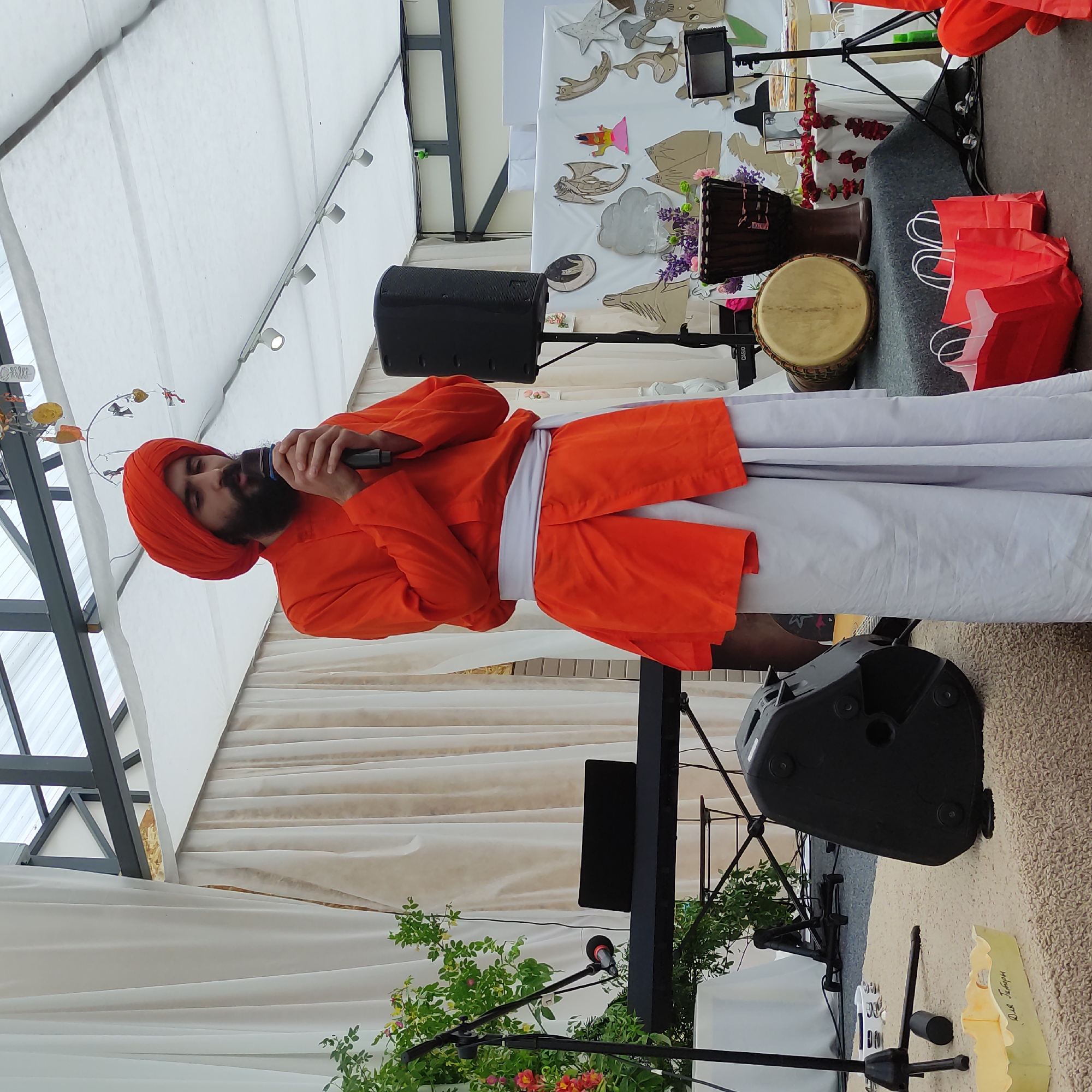 Outdoor spiritual gathering with speakers and meditation in Zhirnosovo