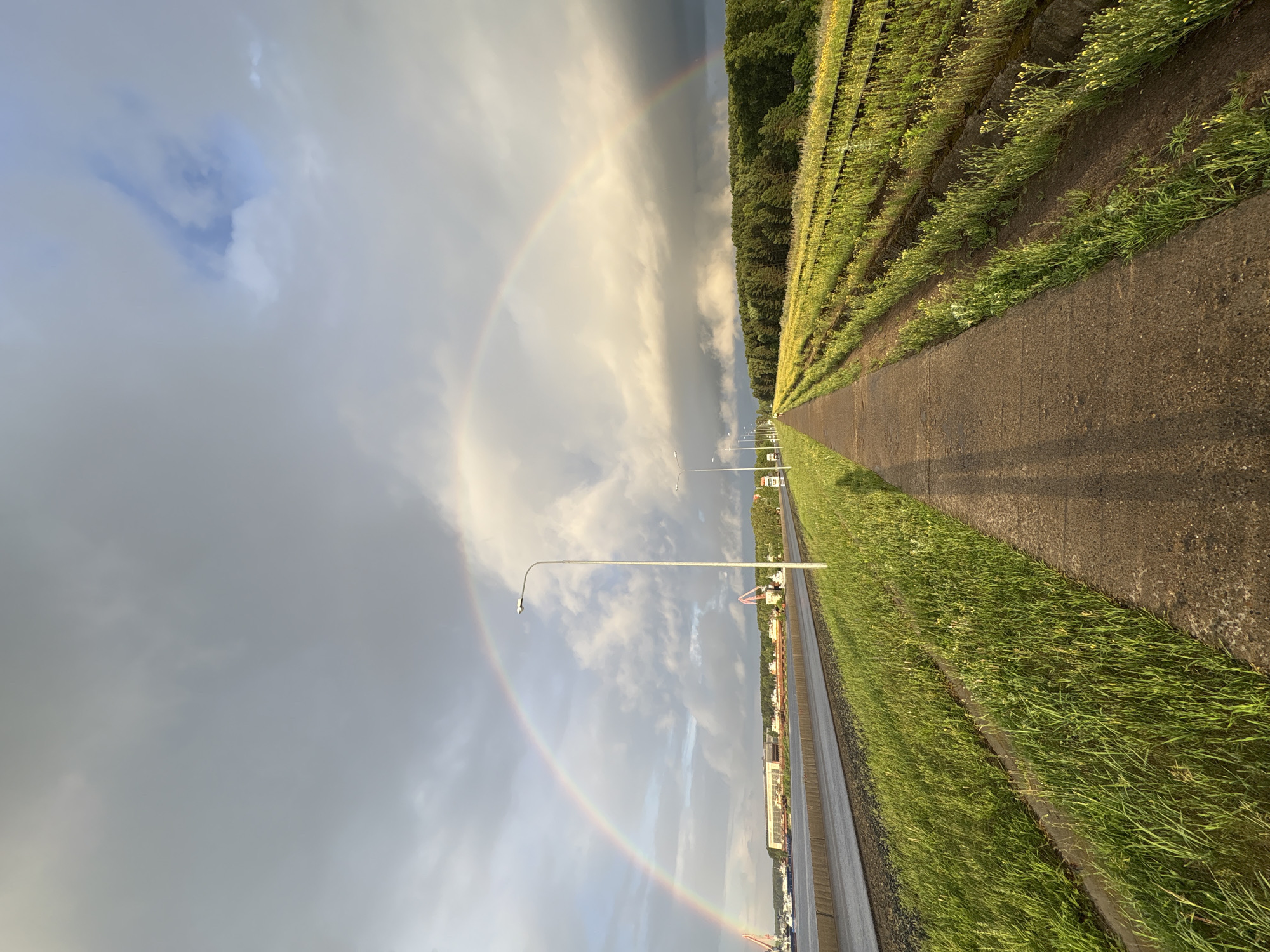 Rainbow appears over Chaikovsky harbor, captured by local residents