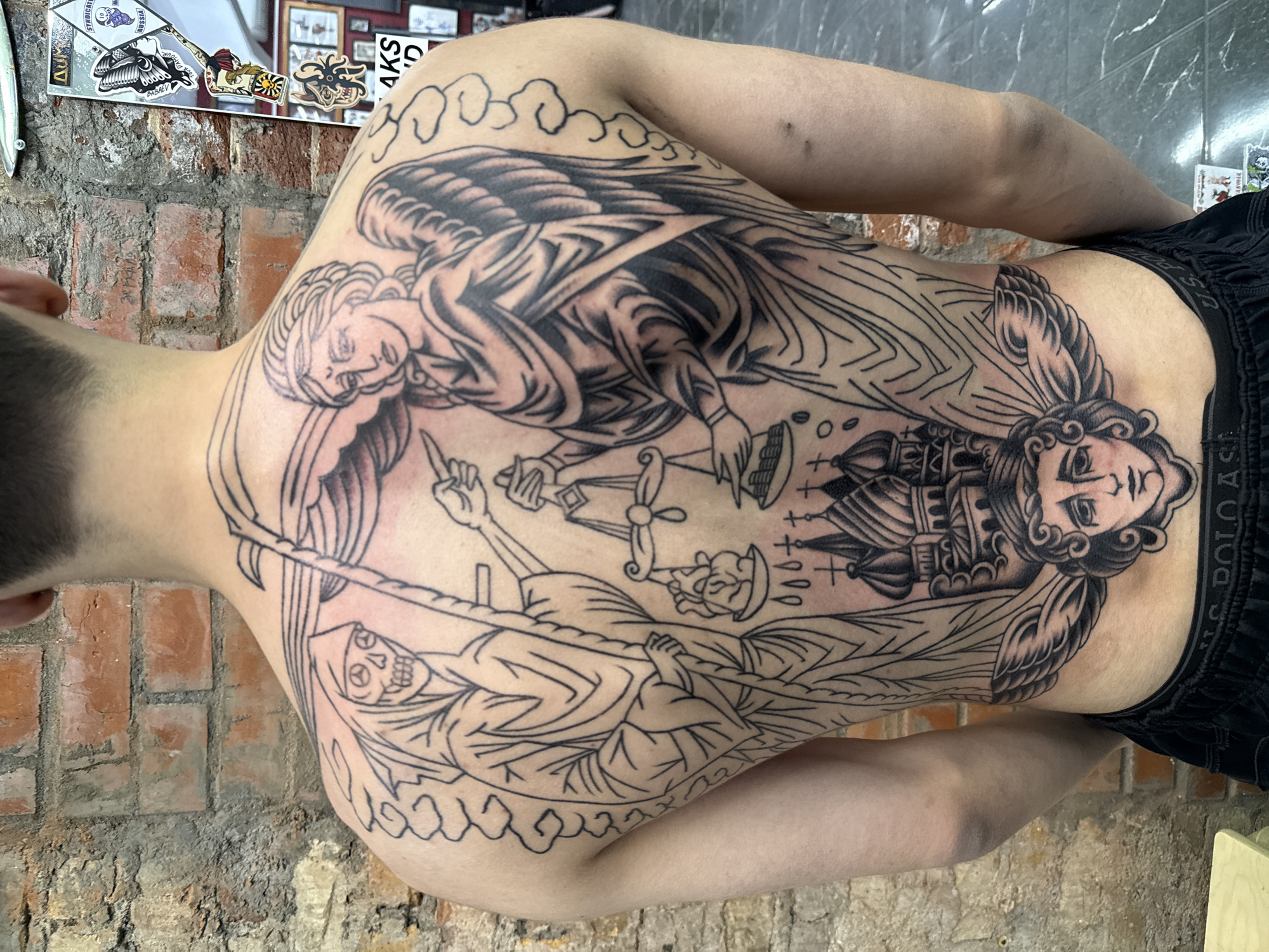 Elaborate Death-Themed Tattoo Spotted in Moscow