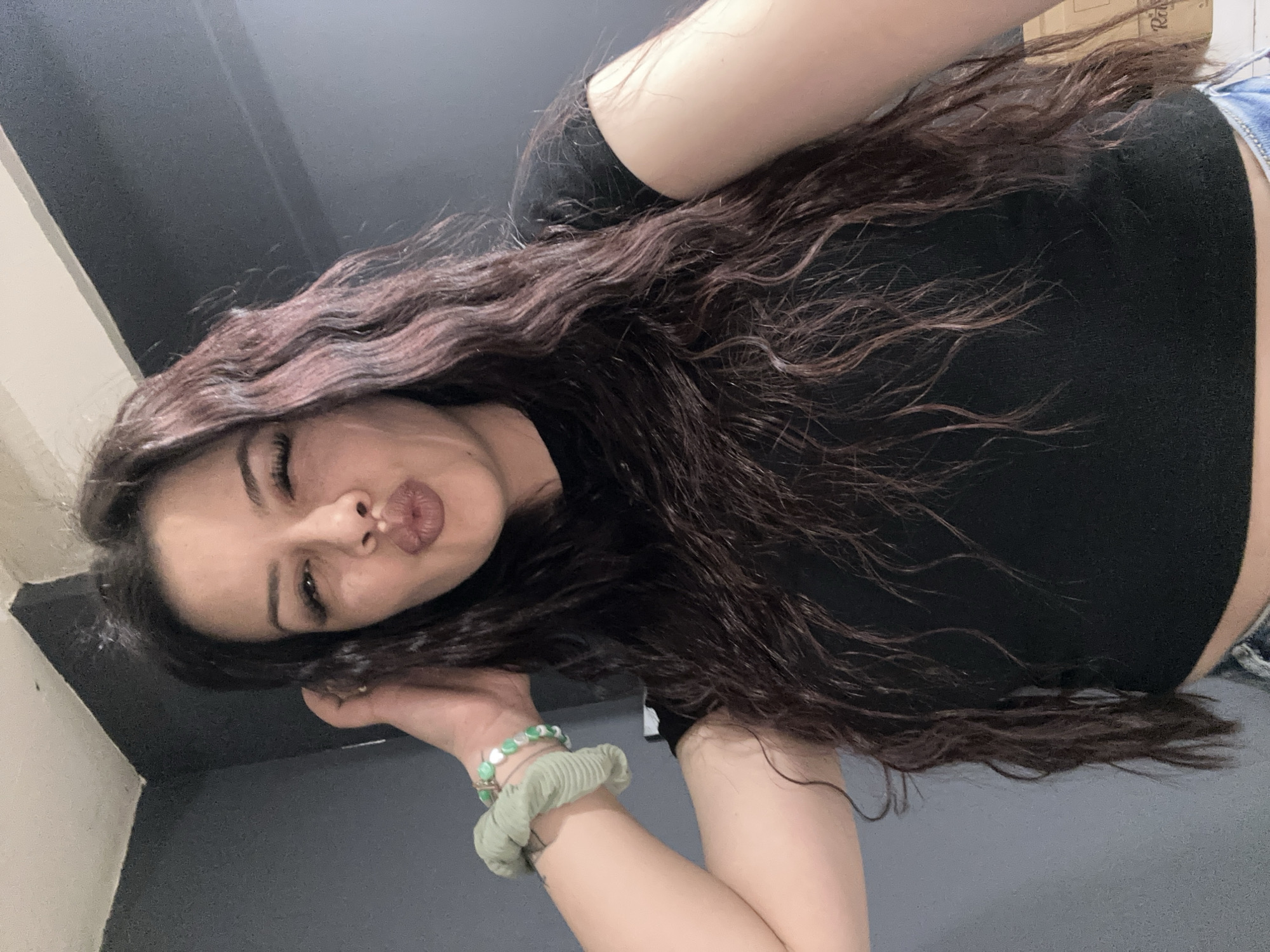 Young woman takes multiple selfies in Sliven, Bulgaria